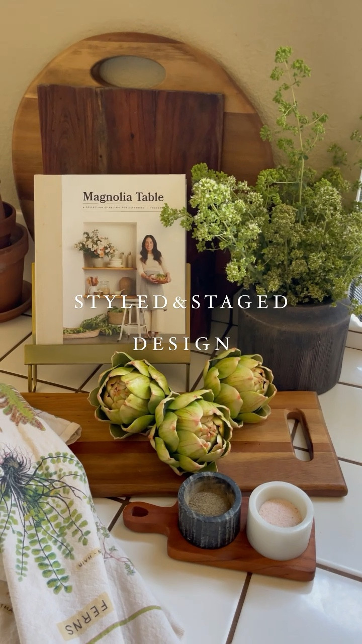 Kitchen styling, kitchen decor, kitchen counter, wood boards, serving boards, charcuterie boards, faux artichokes, kitchen towels,cookbook, Joanna Gaines, Magnolia, Walmart Vase, Viral vase, Better Homes & Gardens, terracotta planters, fresh herbs, salt and pepper cellars, marble, cookbook stand#LTKunder50

#LTKhome #LTKstyletip