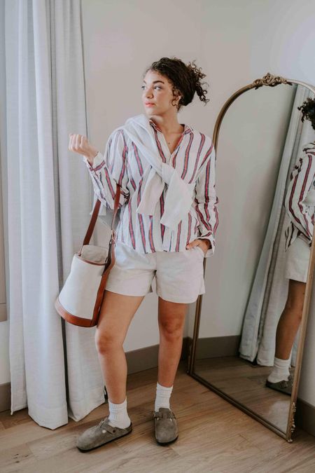 This casual warm weather look starts with a striped button-down. Add white shorts, Boston clogs, and a canvas tote. Perfect for an active Saturday.

#LTKSeasonal #LTKstyletip