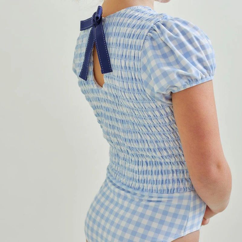 girls oasis blue gingham puff sleeve smocked one piece | minnow