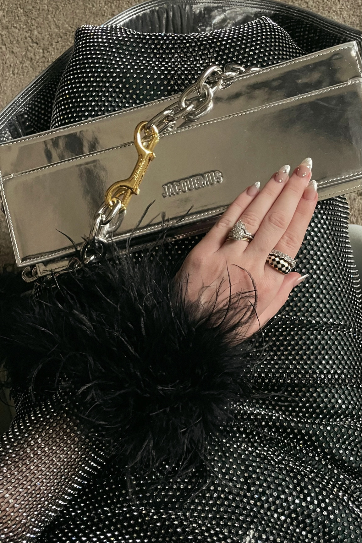 NYE ready ✨ #nyelook #nye #partylook #metallic #feathers #ringstack

#LTKHoliday #LTKstyletip #LTKSeasonal