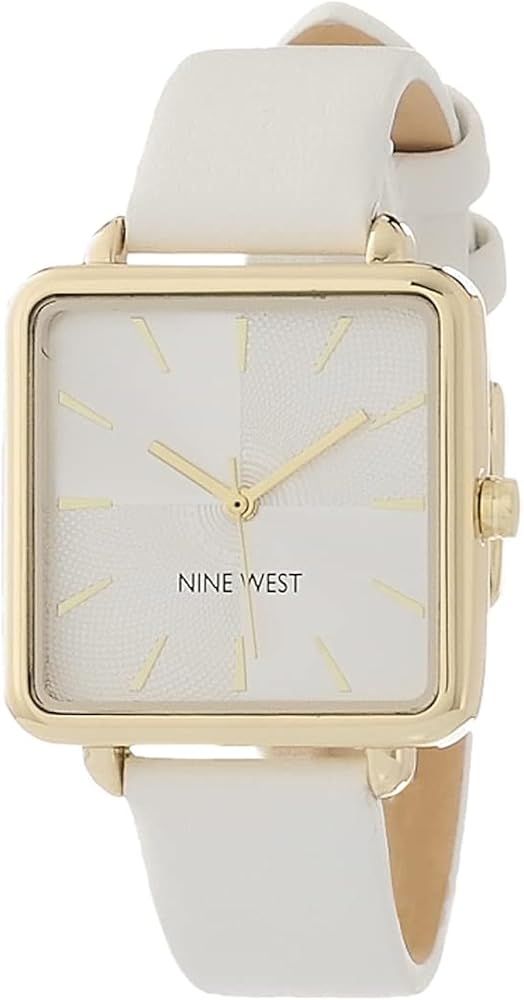 Nine West Women's Strap Watch       
Band Material: Leather 

Clasp: Tang Buckle | Amazon (US)