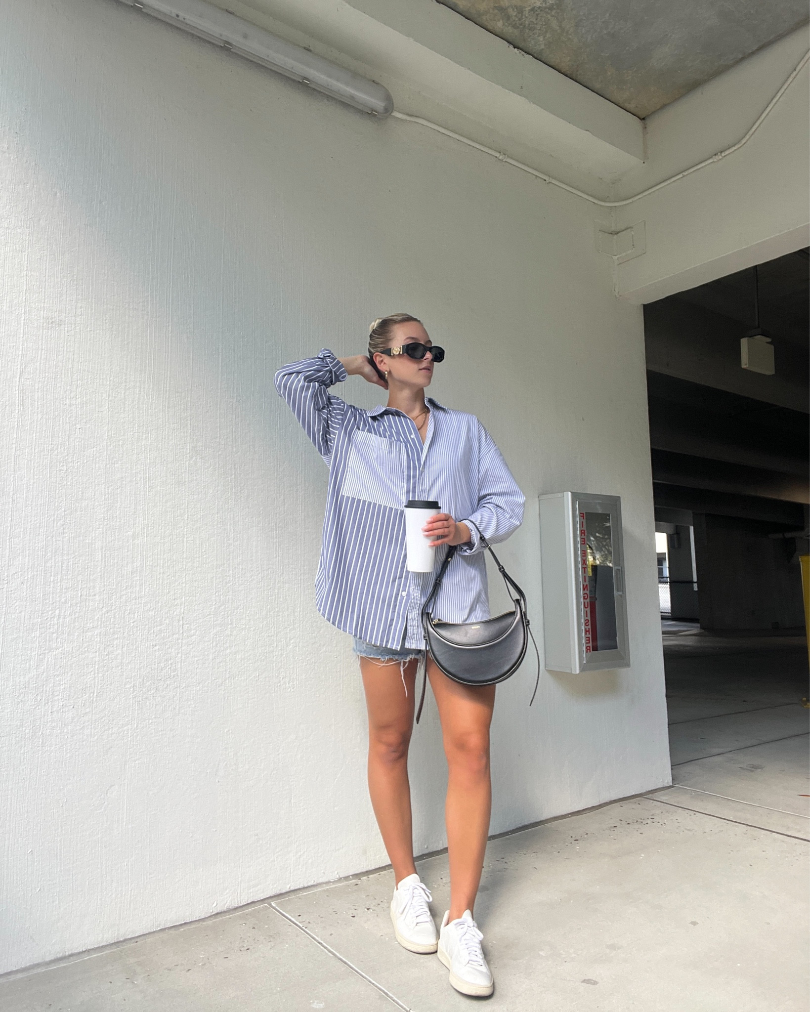 Abercrombie style, oversized shirt, oversized button up shirt, oversized striped shirt, agolde jean shorts, agolde shorts, denim shorts, jean shorts, veja sneakers, all white sneakers, spring fashion 2023, spring fashion trends, summer outfits, summer fashion 2023