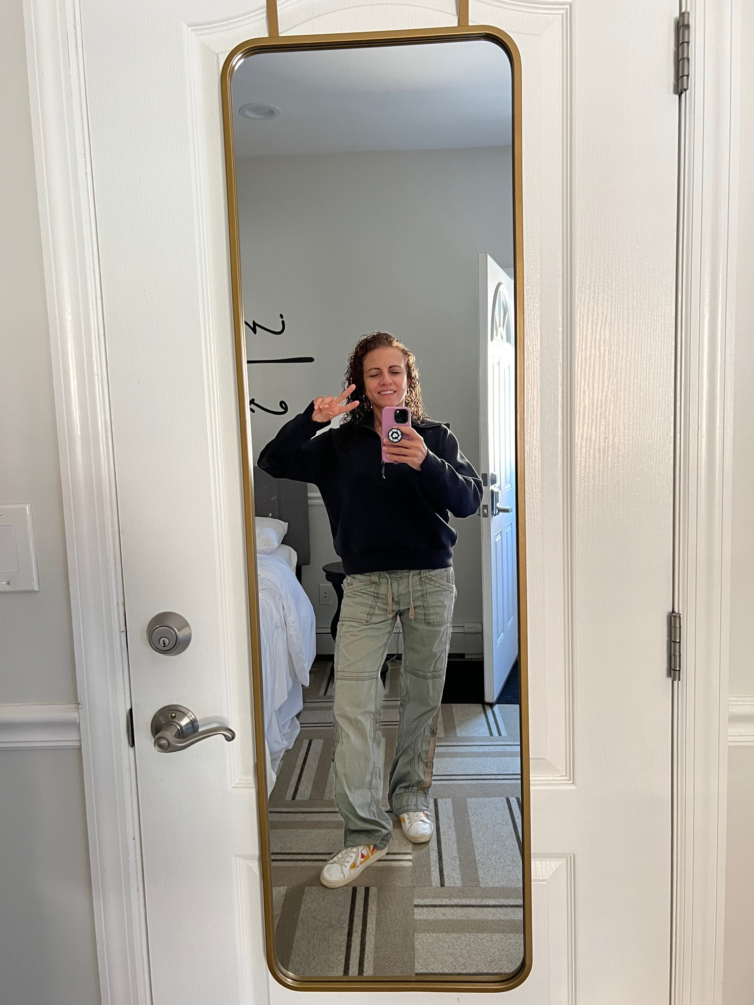 Fall fashion casual Friday work from home. Black pullover half zip, flutter sleeve top with olive parachute pants and good vibes white sneakers! Happy Friday!!

#LTKStyleTip #LTKActive #LTKOver40