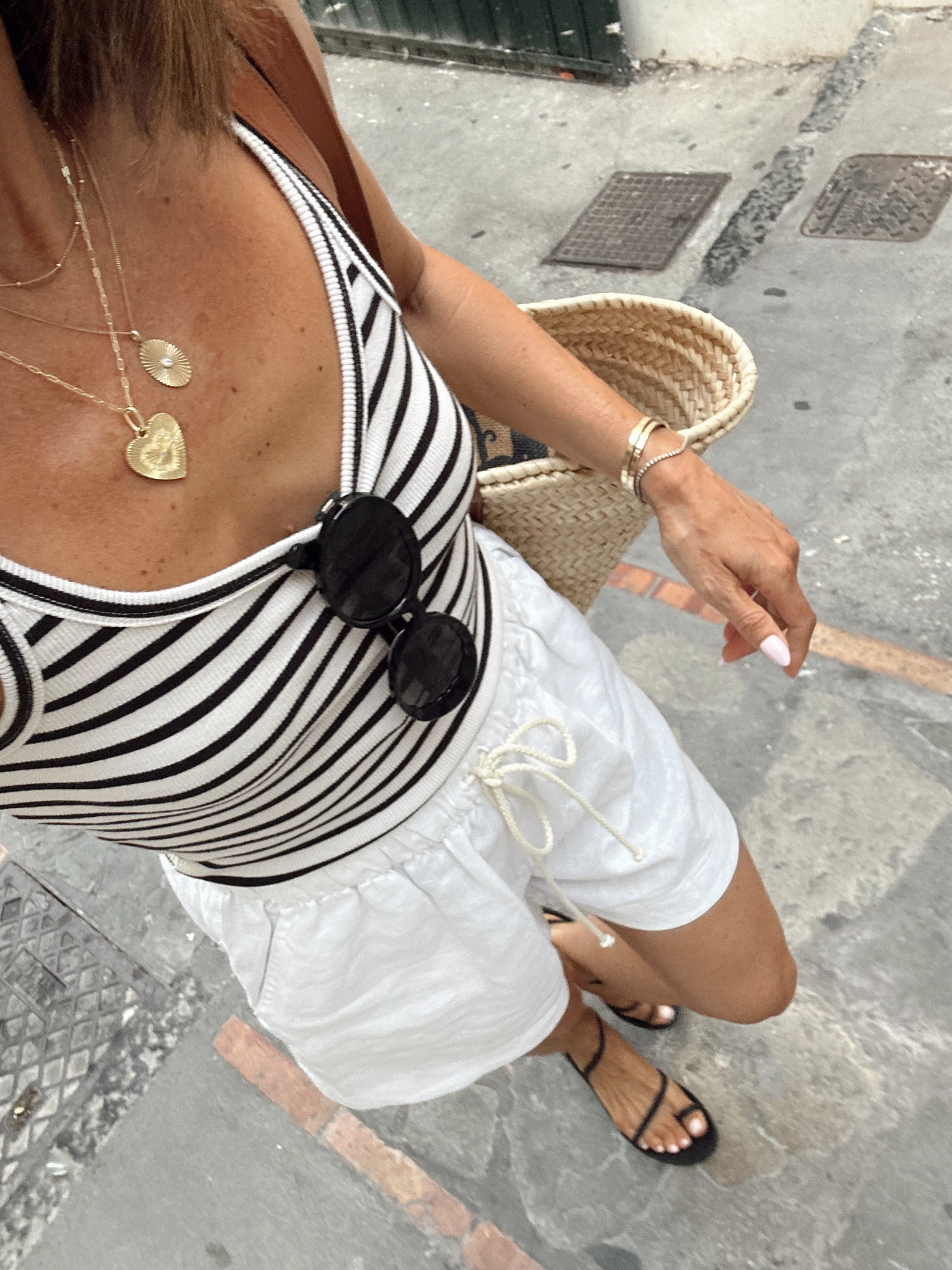 Morning exploring outfit 
Linen shorts are a great longer length 
And tank is one of my all time fav styles I own in both black and white - tts 

#LTKOver40
