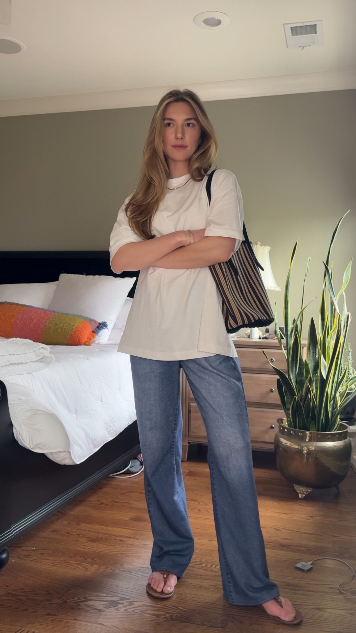 Such a classic look that will never be out of style. White tee, loose denim, flip flops. PERFECTION  

#LTKStyleTip #LTKFindsUnder50