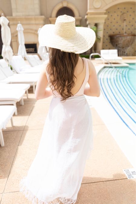 Relaxing pool day at St. Regis Atlanta with some of my favorite woman-owned, sustainable beach packing and style products. #beachday #onepieceswimsuit #linenwrap #strawhat #summeroutfit 

#LTKtravel #LTKSeasonal #LTKswim