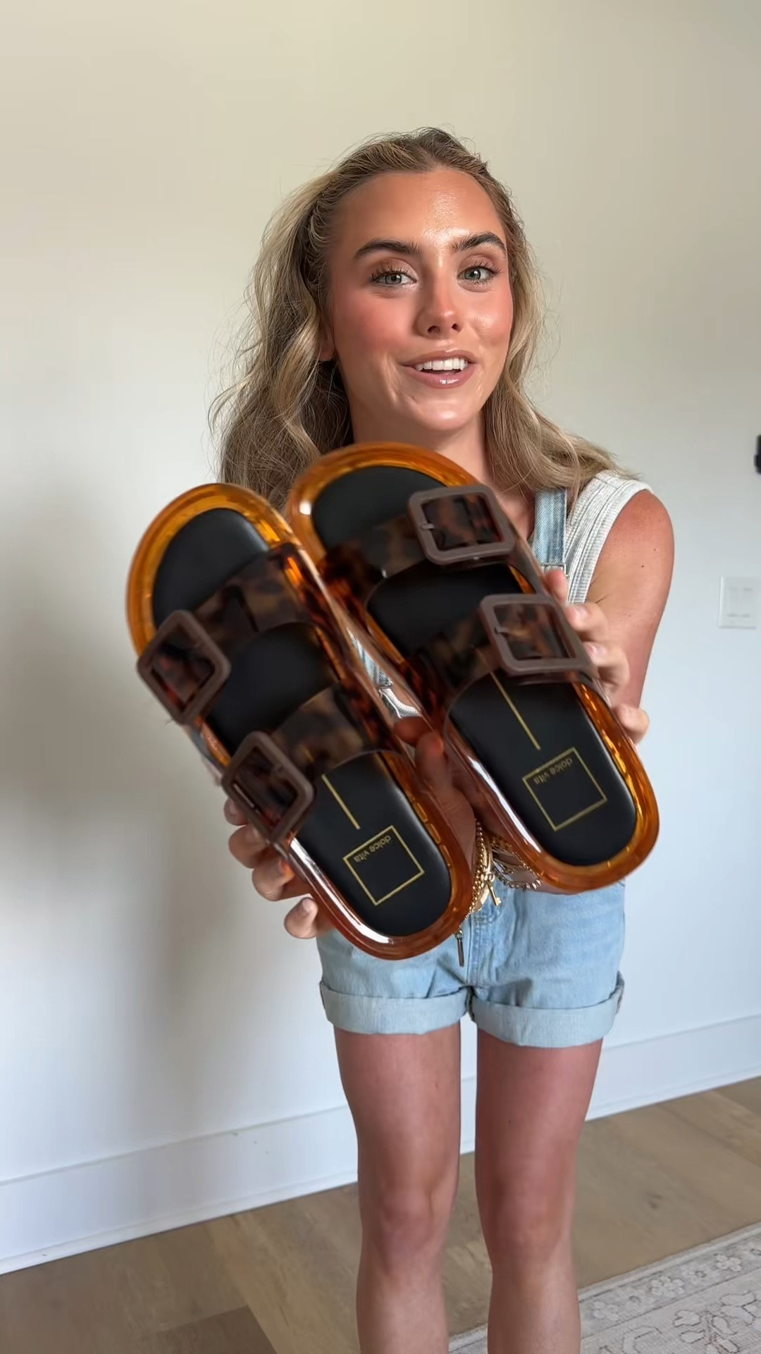 This favorite utilitarian sandal silhouette just got a 90s-inspired jelly makeover. JULIO makes a statement and prioritizes comfort with a contoured footbed, chunky sole, and adjustable straps fitted with oversized buckles all in translucent vinyl. Perfect for beach getaways, poolside lounging, or casual days out, this essential sandal is a playful and cool addition to cut off shorts and cover ups. Choose from whiskey, praline, crystal, or tortoise colorways and find yourself reaching for this sustainably-made sandal every sunny weekend @dolcevita

#LTKootd #LTKSeasonal #LTKdayinmylife