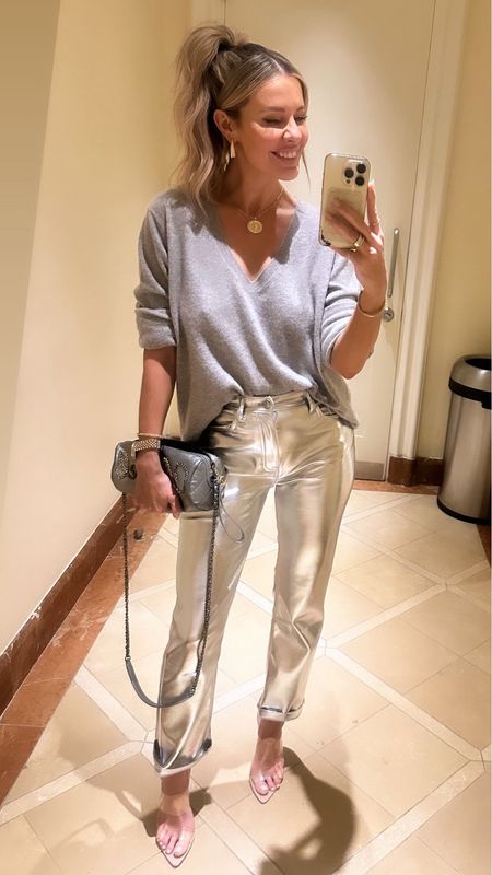Night 2 in Bahamas! I always pack a grey cashmere sweater no matter where I’m traveling to, and thank goodness I did because it was kindof chilly last night after it rained! I’ve had the idea of wearing grey with these silver pants and it was the most chic simple sparkle glam look! ALSO, these are by far my most worn pair of heels (wore them with my second look on my wedding night) and they are so inexpensive and comfy and make your legs look miles long. The earrings are an additional 40% off fyi! // sizing: pants/25 short, sweater/medium, heels/TTS

#LTKshoecrush #LTKstyletip #LTKtravel