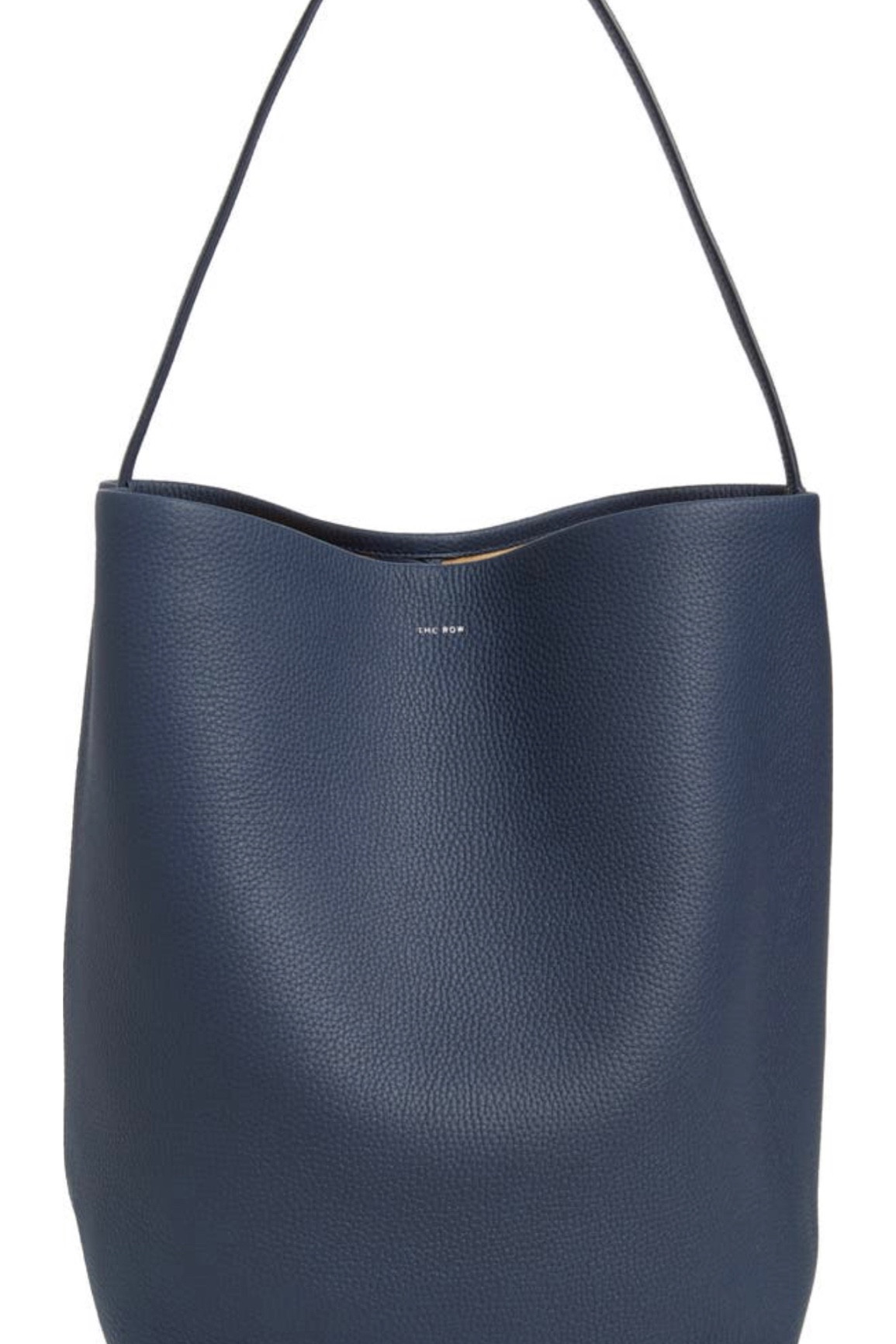 If you are considering purchasing a bag by The Row. Let. Me. Tell. You. The N/S Park medium tote is it. I own quite a few all of which I absolutely love. But of all of them, this might be the most reasonable and thoughtful when it comes to a first purchase from the brand. It comes in a variety of colors and I felt for summer.. blue was the way to go!!!! Adds some variety and color depth to my closet and added a styling challenge for me with a colored accessory. 

#LTKworkwear #LTKFind #LTKitbag