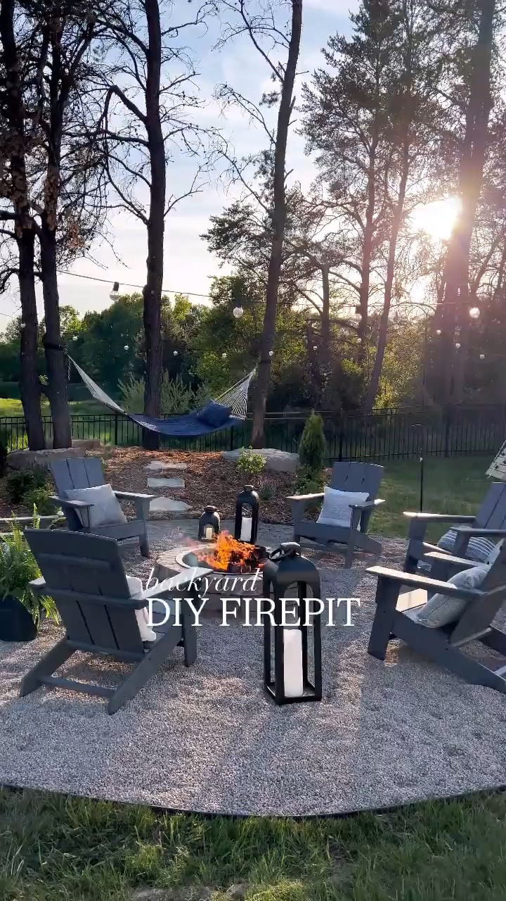 DIY firepit in our backyard - here’s how we did it! We first mapped out an 18 ft diameter ring using a string attached to a stake and spray paint fan. Then we tilled up all the grass & added landscape border, fabric, & pea gravel. We used this firepit kit from @loweshomeimprovement that I’ll link! 

We landscaped the area behind and then of course added in all the fun decor like these solar string lights, the BEST Adirondack chairs (super durable and we leave them outside year round!) 

Comment FIREPIT below for a link of all the supplies we used! 

DIY firepit 
Outdoor spaces 
Backyard inspiration
Backyard design 
Outdoor projects 
Fire pit DIY 
Patio design 
Backyard space #LTKWatchNow#LTKFamily


