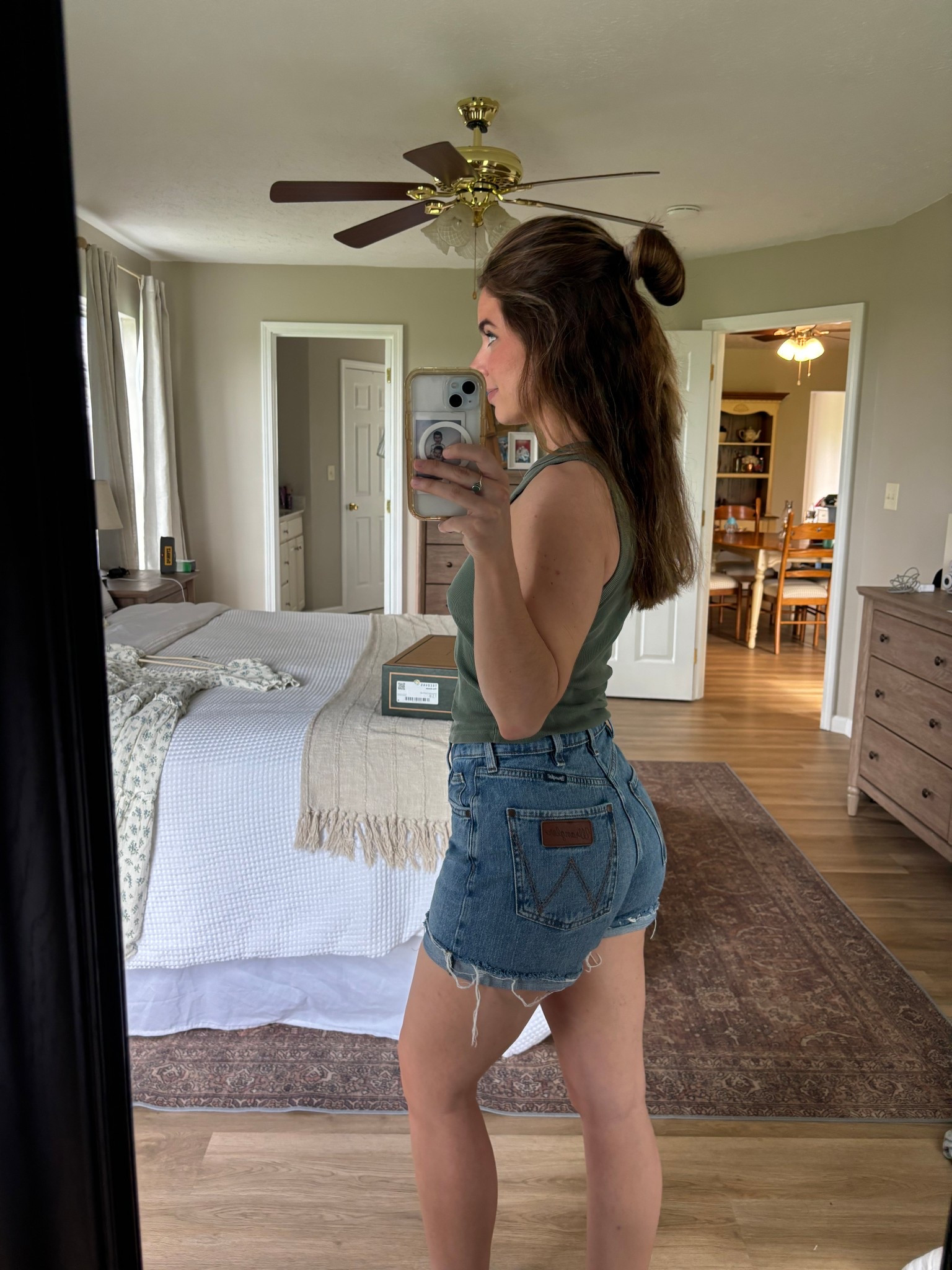 SAHM ootd! Trampoline, kite flying, and putting up fencing. Just another day on the farm 🫡 literally live in @Wrangler shorts all summer! My favorite Jean shorts. Flattering on all body types! 

#LTKgrwm #LTKmorningroutine #LTKootd