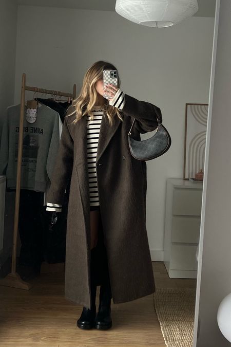 This oversized brown weekday coat is perfect teamed with a striped jumper and mini skirt 

Coat - size small
Jumper - size m



#LTKstyletip #LTKeurope