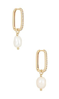 By Adina Eden Pearl Dangling Huggie in Pearl White from Revolve.com | Revolve Clothing (Global)