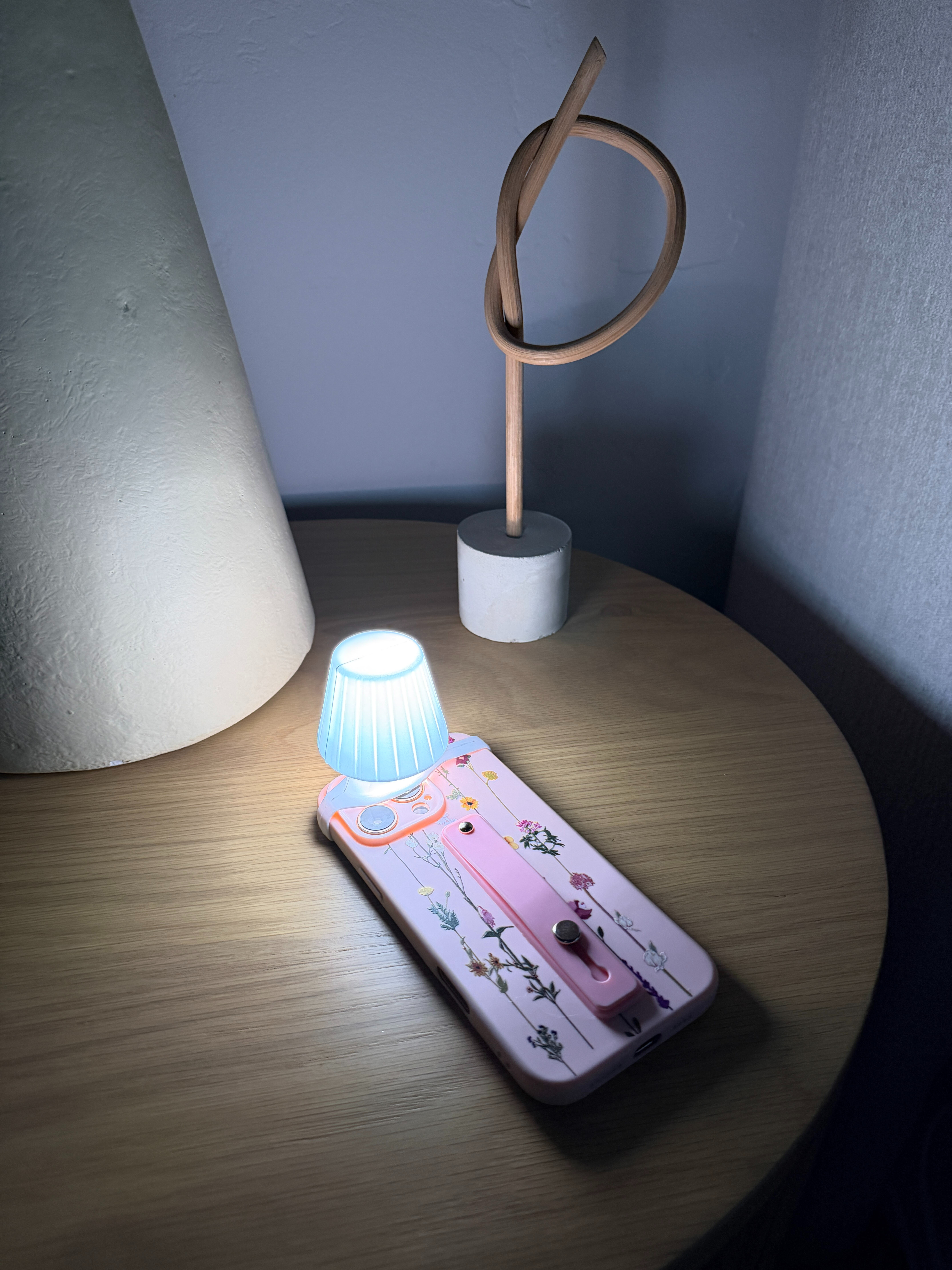 A mini lampshade for a cell phone is a tiny, whimsical accessory that turns your phone’s flashlight into a soft, ambient glow. It’s like shrinking a table lamp down to pocket size.
 

 #LTKmomlife