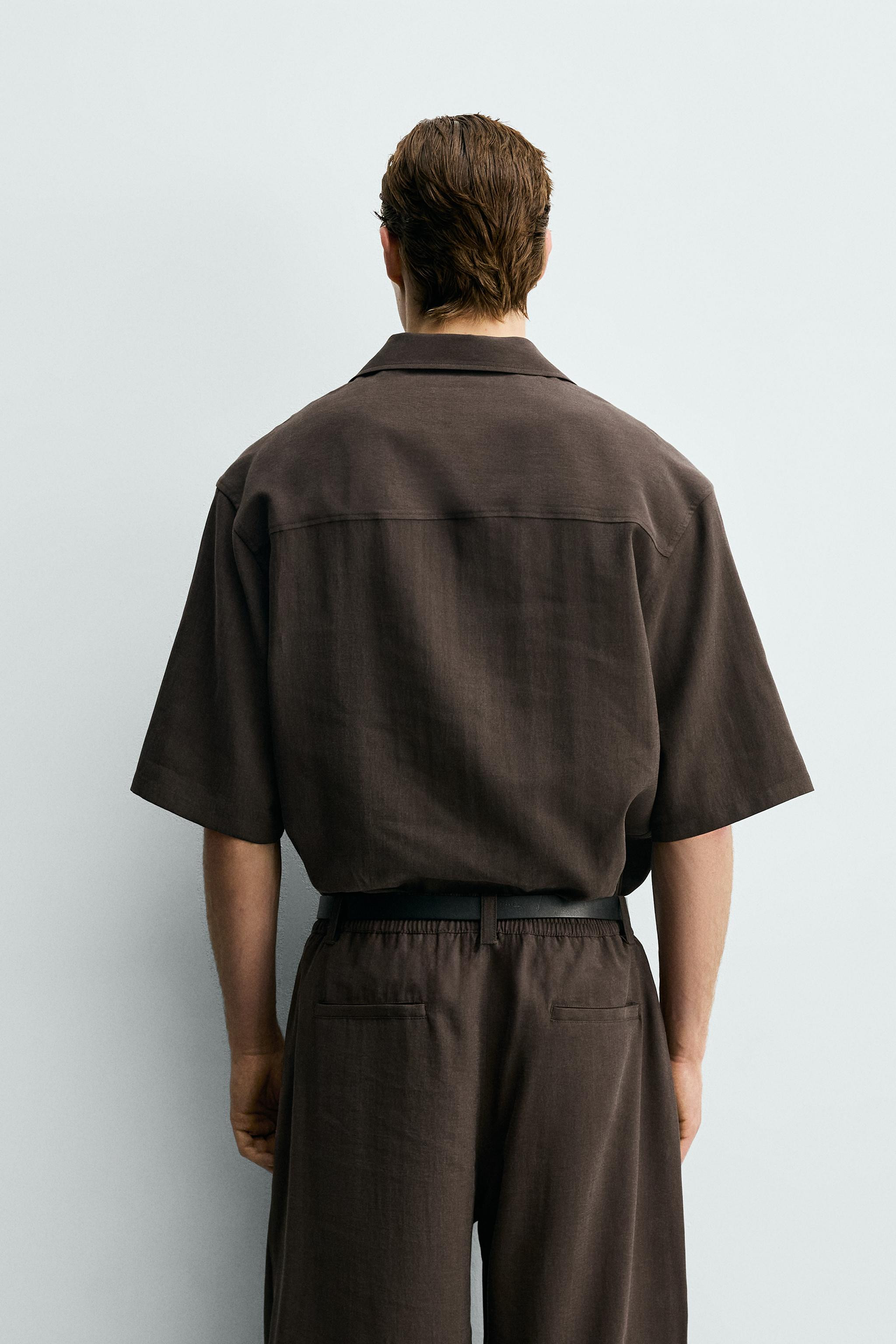 Model height: 188 cmRelaxed fit shirt made from a flowing lyocell blend fabric. Featuring a camp ... | Zara UK