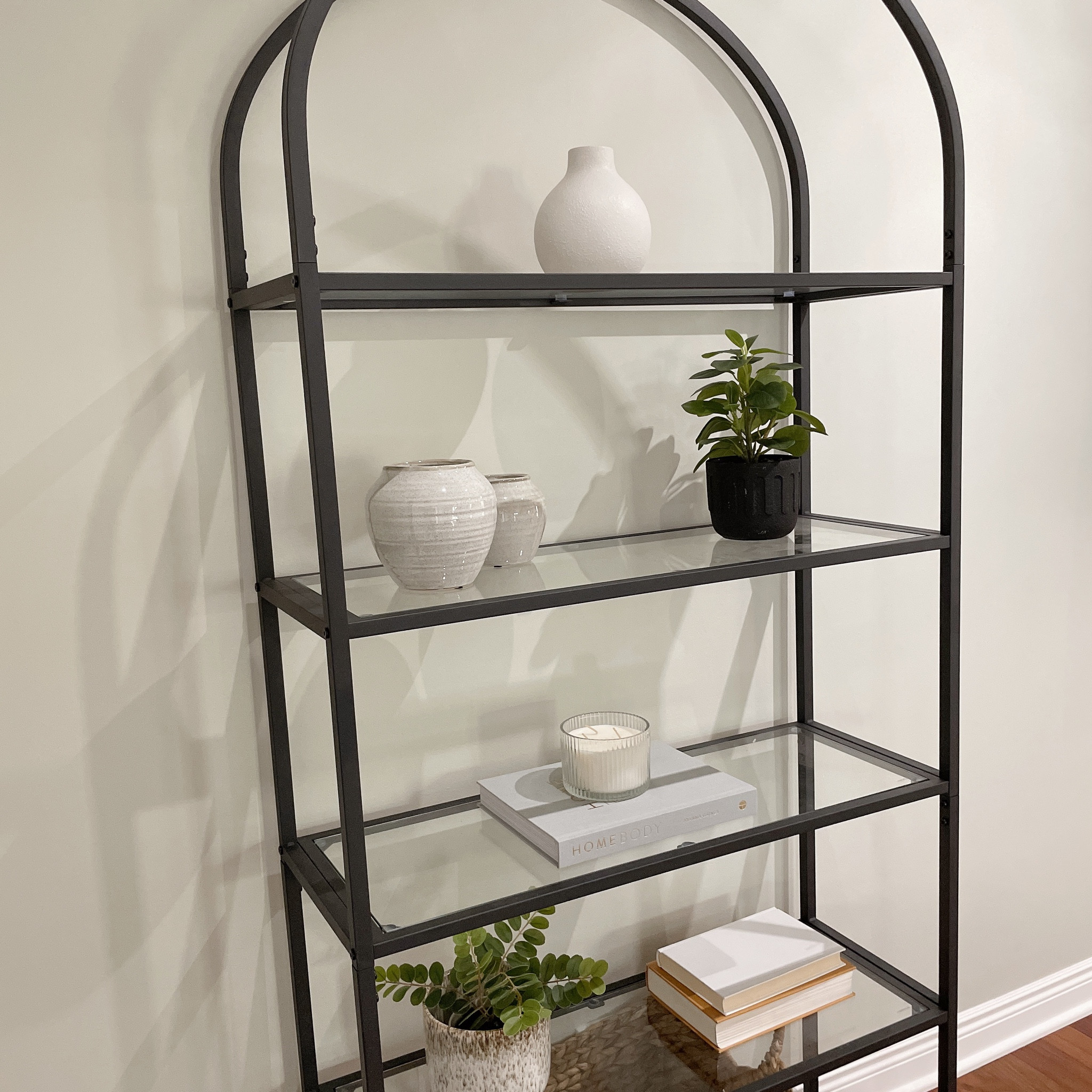 Shelf styling 
Arched bookcase, decor, plants, vases, home staging 

#LTKhome #LTKstyletip #LTKunder50