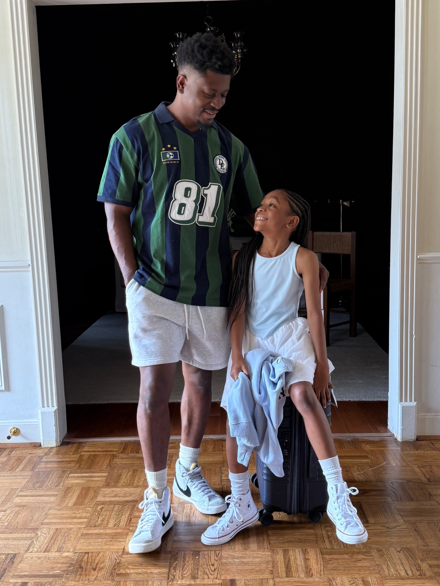 Father and daughter travel outfits to go to sporting event... soccer dad 
Soccer polo, grey sweat shorts, girls athleisure dress, and high top converses 

#LTKStyleTip #LTKKids #LTKFamily