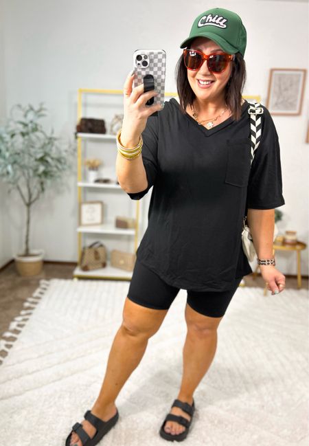 Oversized tee from Amazon!  Size large fits perfectly!  Love the length on this one. 8 inch biker shorts by my favorite athletic brand on Amazon!  Size large.  Feel like aerie but they’re Amazon!  Sandals fit tts. New trucker hat from Target. Adjustable in the back and has mesh material to make it breathable. Sunnies have 100% protection from UV rays!  

#LTKMidsize #LTKOver40 #LTKFindsUnder50