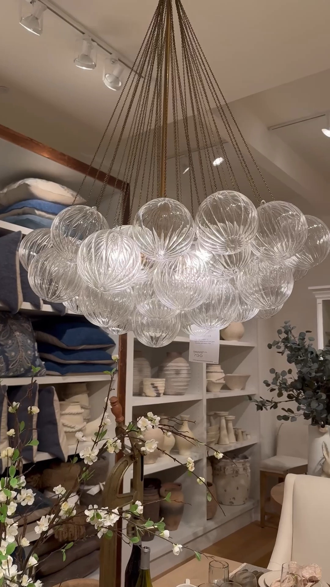 Eye catching glass globe chandelier, home decor

#LTKHome #LTKdayinmylife #LTKSeasonal