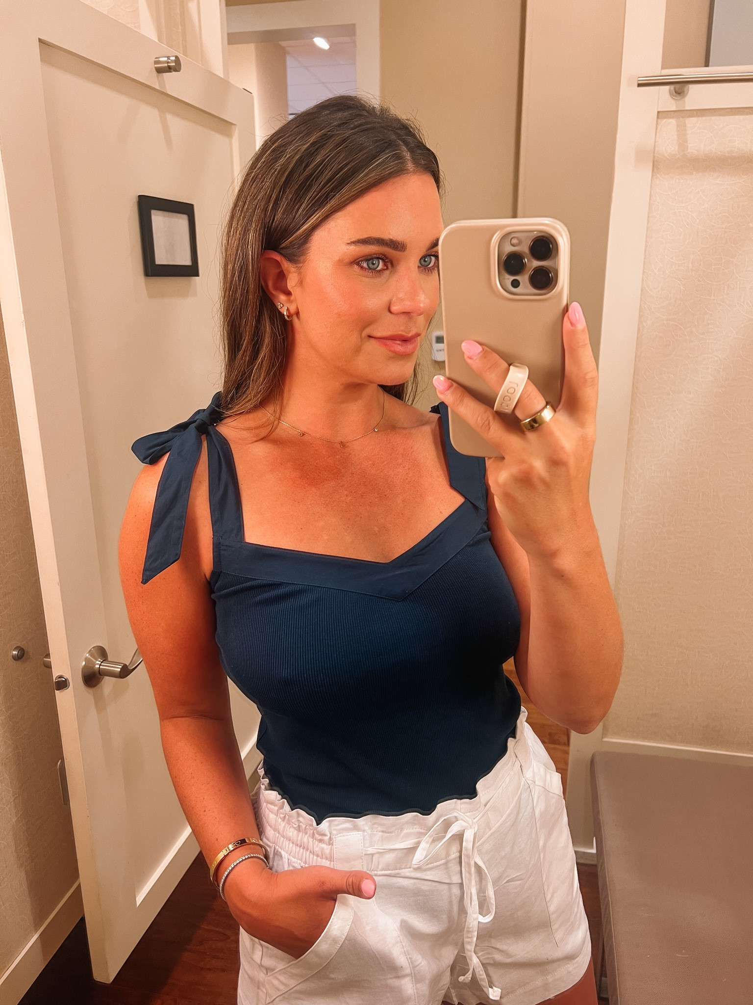 Love this cute little bow tank! 

#LTKsalealert #LTKstyletip #LTKunder100