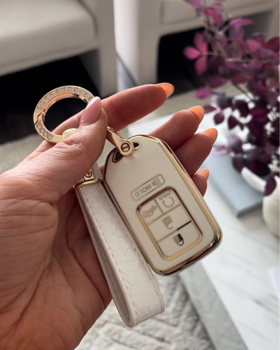The prettiest car key fob cover and key chain ✨ available in multiple colors and car makes/models! Comes with 2 different key chain straps too 🤩 

Amazon find, aesthetic keys, white and gold key cover, white and gold car keys

#LTKFind #LTKtravel #LTKunder50