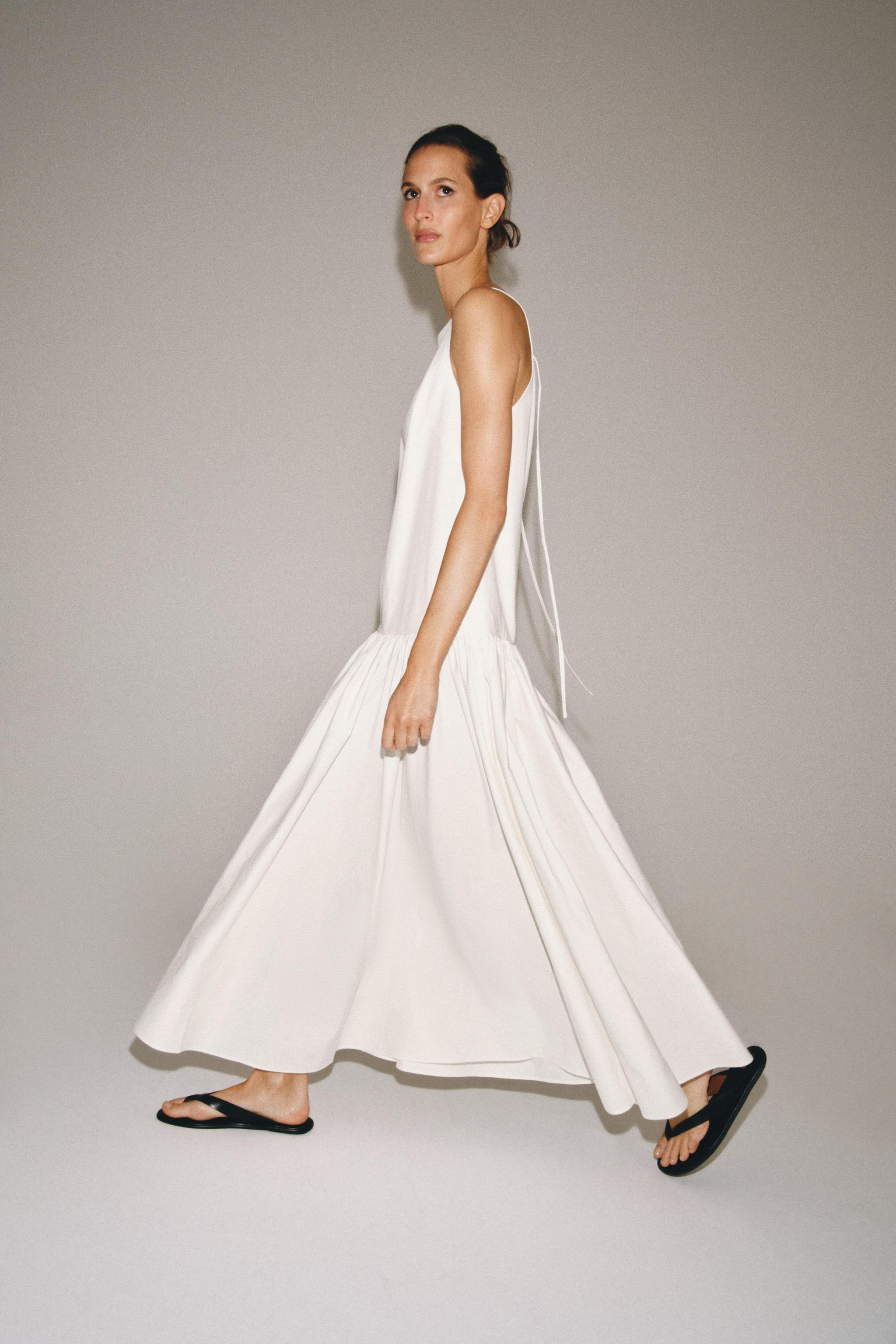 ZARA WOMAN COLLECTIONDress made of cotton blend yarn. Straight neckline and thin straps. Pleat de... | Zara US