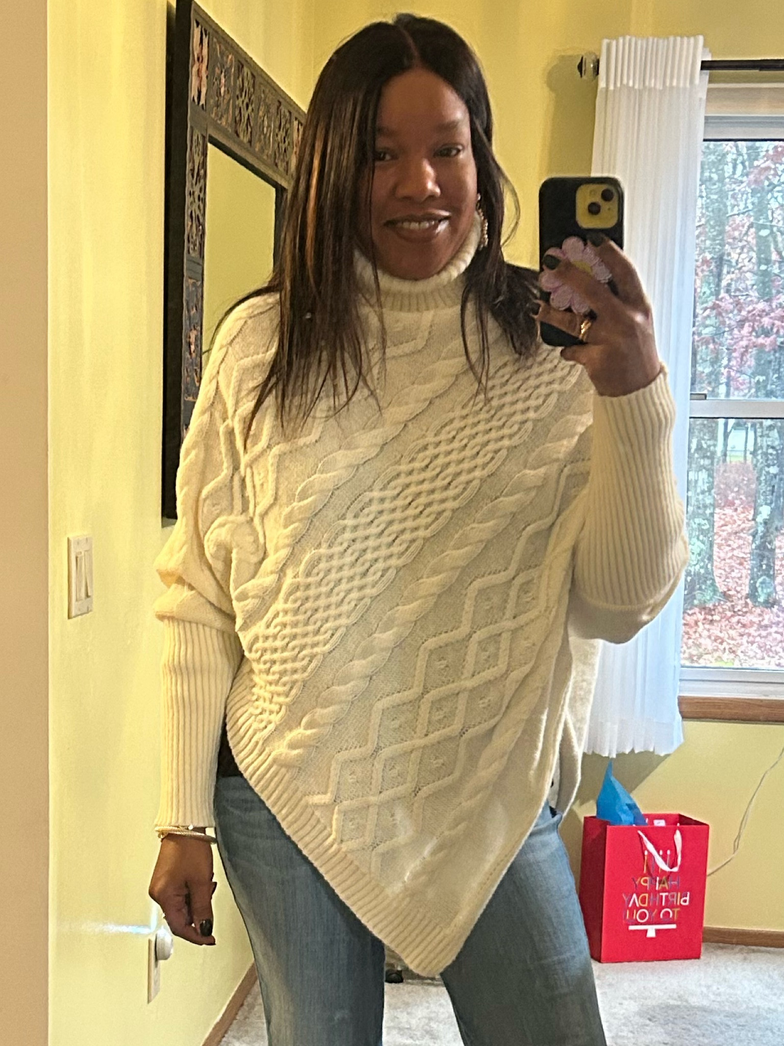 Cute turtleneck sweater with asymmetrical hem.  Only $16 and comes in numerous colors.  Washes well.  Fits true to size.  

#LTKStyleTip #LTKFindsUnder50 #LTKOver40