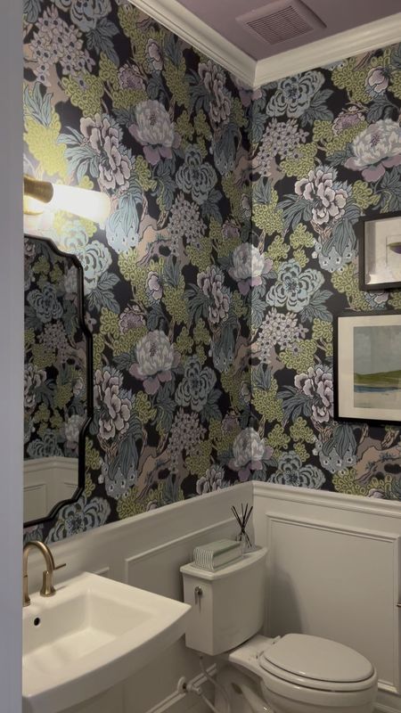 Powder room style. We love a good wallpaper for a hall bathroom. 
Floral wallpaper, powder room style, sconce, artwork, vanity mirror

#LTKfamily #LTKstyletip #LTKhome