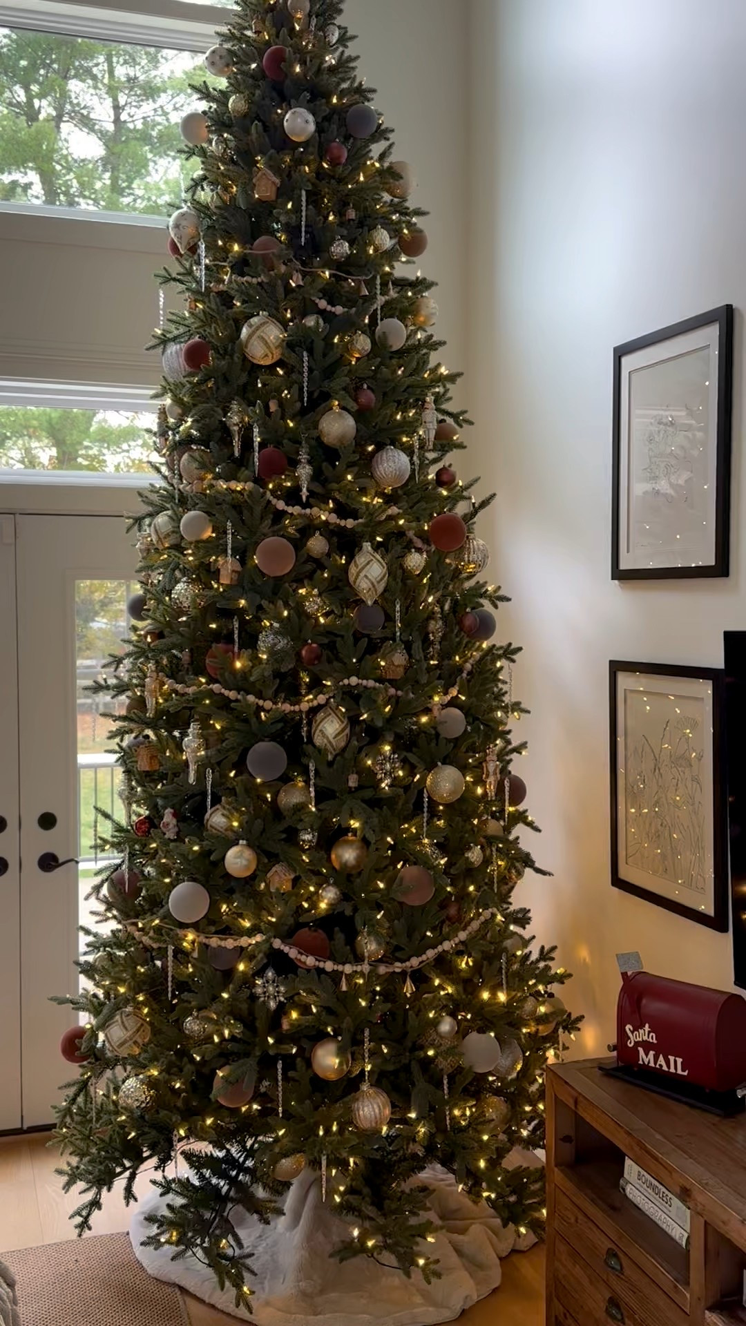 The big tree is up! 12 ft Christmas tree in nostalgic neutral decor using McGee and Co new flocked ornaments as the base layer 25% off right now!

#LTKSaleAlert #LTKHoliday #LTKFindsUnder50