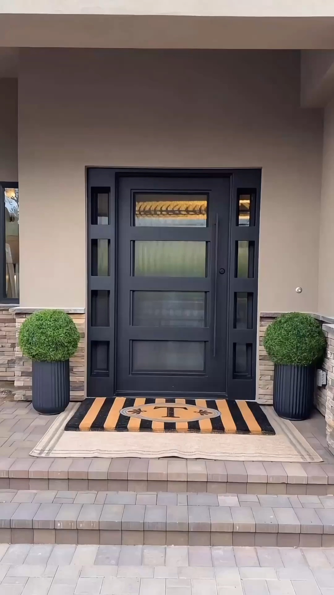 A touch of greenery, an oversized doormat I love, and a fluted vases that do all of the talking 🤍 I love simple decor. 

modern front porch
oversized doormat
fluted vase decor
neutral outdoor decor
simple porch styling


#summerthompsonstyles


#LTKvlog #LTKdayinmylife #LTKHome