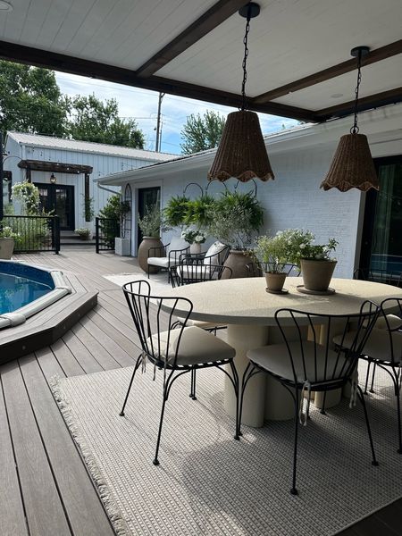 My deck project is complete! Shop all of my furniture, rugs, and planters here! Organic modern outdoor vibes. Outdoor rugs and furniture. Planters. European style. Neutral patio. Above ground pool. Porch. 

#LTKSeasonal #LTKhome