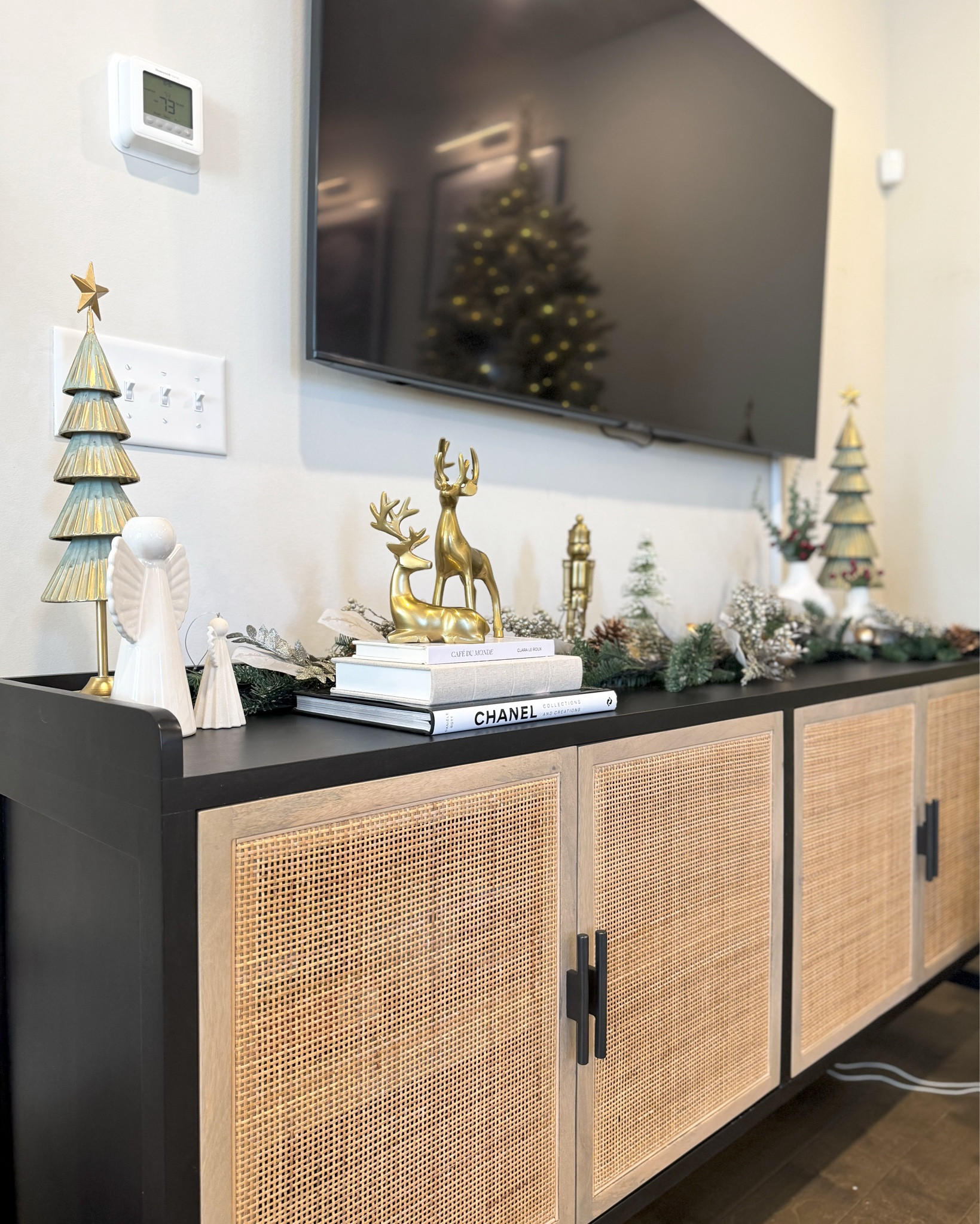 The most magical time of the year 🎄

Target and world market had SO many good holiday finds this year!! Like this garland from WM, which is not only stunning, but is amazing quality and  affordable! 🥰

#homedecor #holidaydecor 
#homeinspo #tvstand #garland #tvstanddecorating 

#LTKHome #LTKHoliday #LTKSeasonal