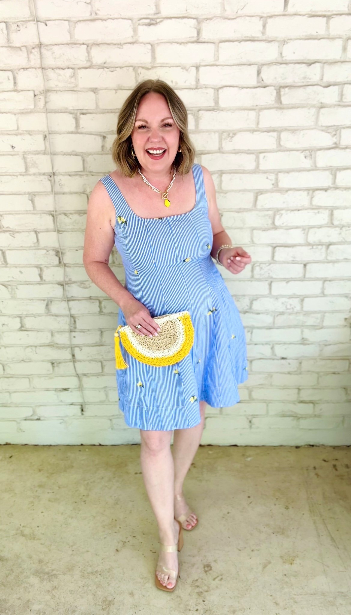 A fun summer dress with small and bordered lemons, I’m in a size small, it runs large so size down one. I’m a usual size 10/medium. Unfortunately, my lemon clutch is sold out, but I linked several similar options.

#LTKFindsUnder50 #LTKMidsize #LTKOver40