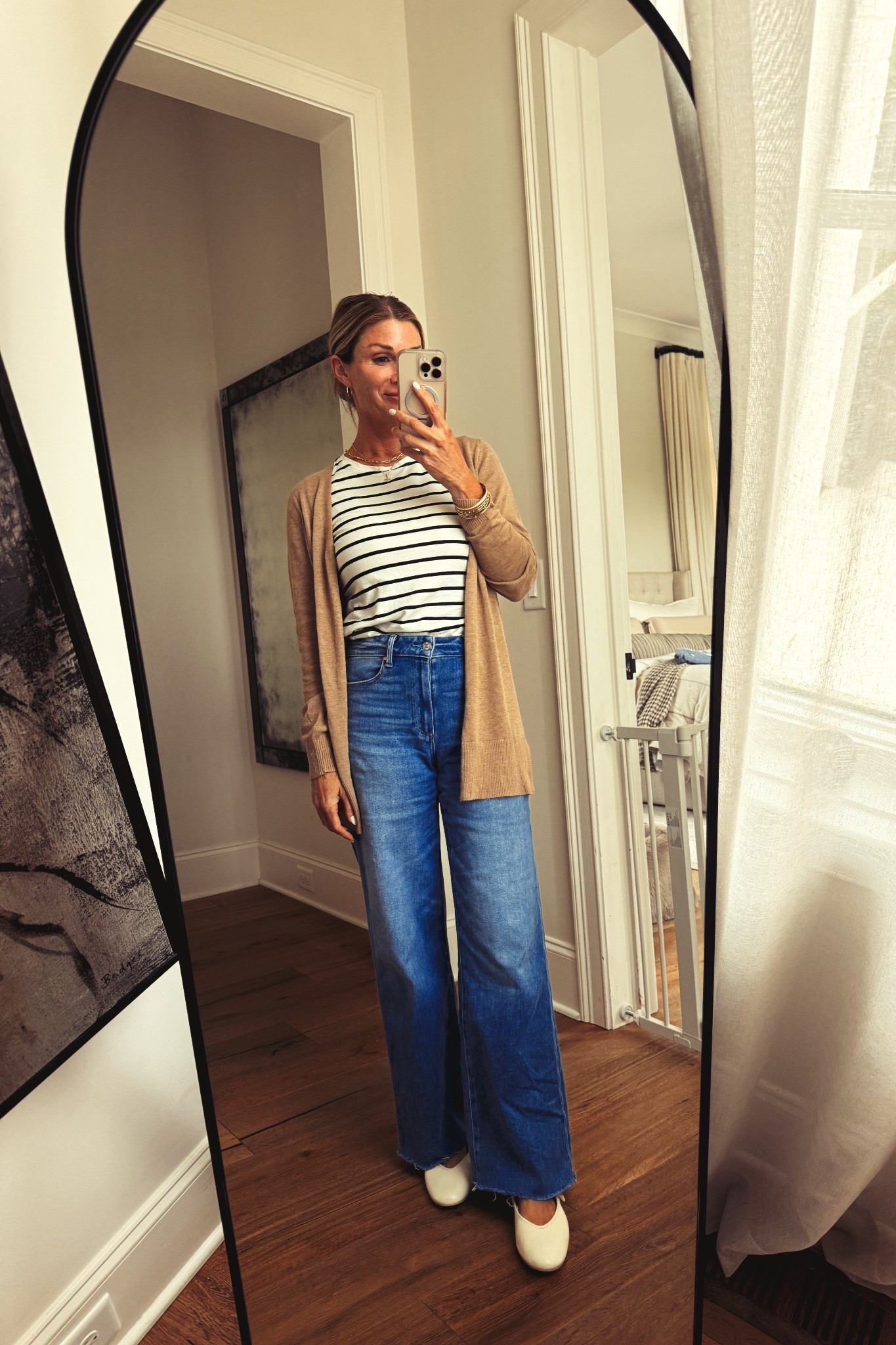 Wearing a small in cardigan 
XS in tshirt (runs big) 
Jeans TTS 
Shoes size down 1/2 size 