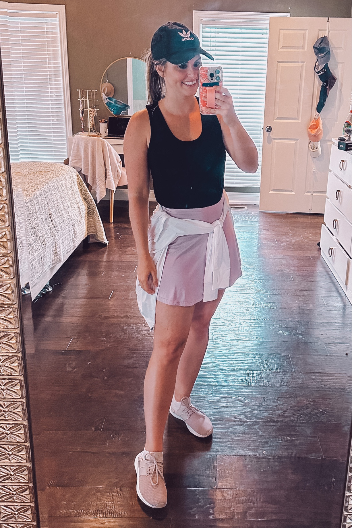 Loving this tennis skirt trend!! Paired it with a black studio workout tank and white running jacket that is light weight and perfect for hiking, running, soccer games or anything outdoors! Linked my adidas sneakers and hat below too. 

#LTKunder50 #LTKBacktoSchool #LTKtravel