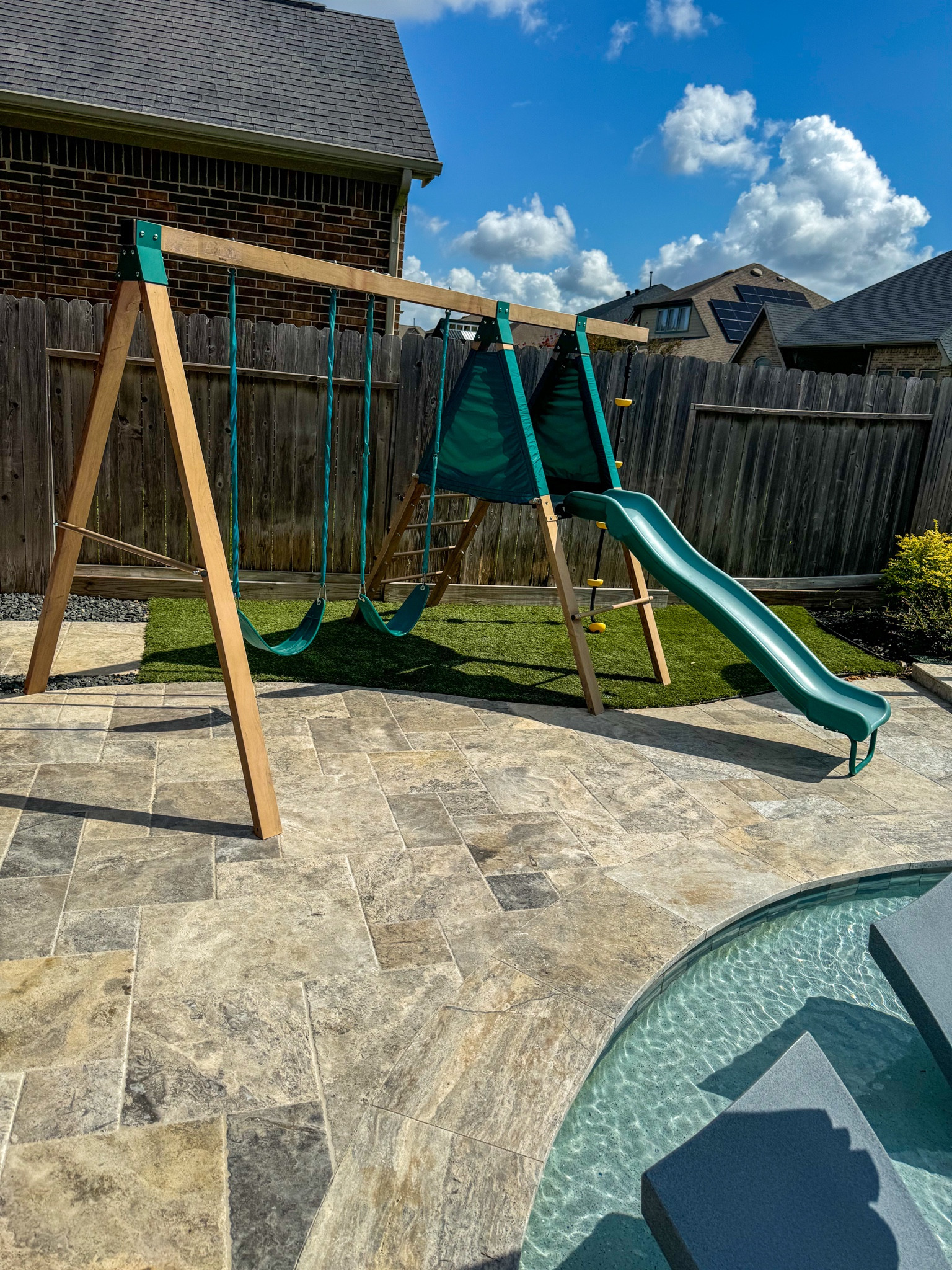 Our favorite swing set! The metal is made to look like wood so there’s no fading!