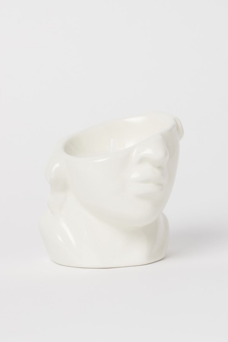 Scented candle with one wick in a head-shaped ceramic holder. Burn time 5 hours. Diameter 4 1/4 i... | H&M (US + CA)
