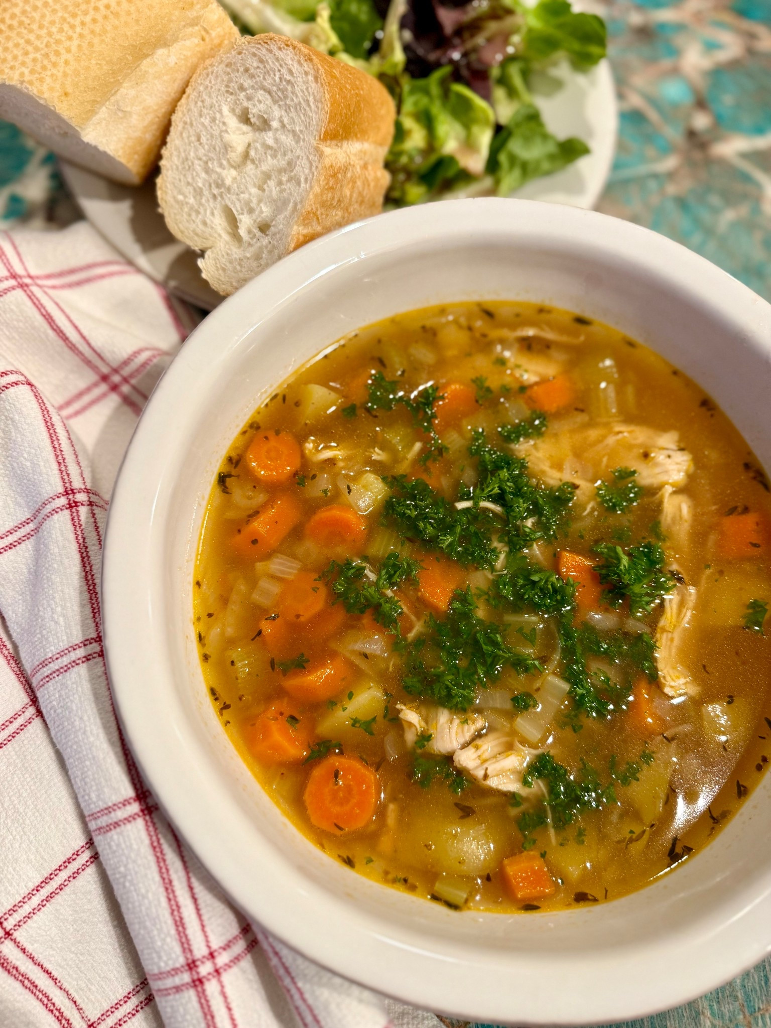 It’s soup season and I was craving a healthy but delicius soup last night and came across this instant pot chicken and veggie soup recipe. Bryce and I couldn’t believe how good it was and the best part is it took 10 minutes to make. I threw all of the ingredients into my instant pot and had soup perfection. I served with a crisp green salad and crusty bread and I will definitely be making it again soon. 

Instant Pot chicken and veggie soup

Ingredients:  1 1/2 tbsp olive or avocado oil 1 medium white or yellow onion, diced 3 celery ribs, diced, about 1 cup 1 tbsp garlic, minced 6 cups chicken stock 1 1/2 lbs chicken breasts or thighs, skinless, boneless, diced into 1-inch pieces 3 large carrots, chopped, about 2 cups 2 tsp salt 1 tsp black pepper 1 tsp dried oregano 1 tsp dried thyme 1/2 tsp onion powder
I also added a few chopped baby potatoes 

Instructions:
* Turn your Instant Pot to the sauté setting. When it’s hot, add your oil and then the diced onion, celery, and minced garlic to the Instant Pot. Stir and sauté the onion until translucent, about 2 to 3 minutes. Once done press the cancel button to stop sautéing.  
* Add chicken stock, chicken, carrots, potatoes, salt, pepper, oregano, thyme, and onion powder to Instant Pot.

* Seal the Instant Pot. Set it to Pressure Cook (or Manual, depending on the model Instant Pot you have) on high pressure for 10 minutes.  
* Carefully release the steam once done. Garnish with fresh chopped parsley before serving.  


#LTKHome #LTKSeasonal