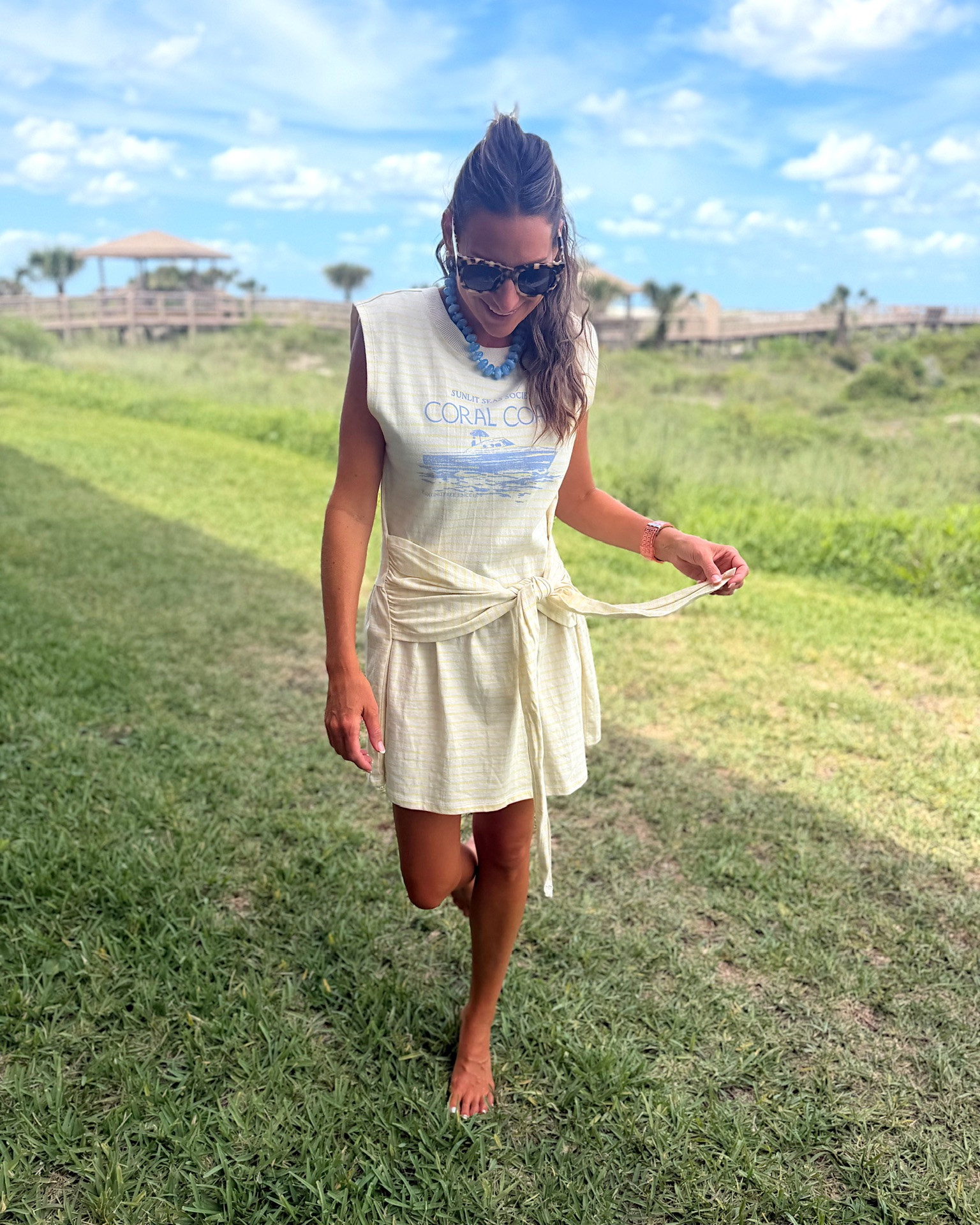 Beach vacation ootd! In a small dress, necklace, sunglasses and accessories - fits tts.

#LTKootd #LTKTravel #LTKSeasonal