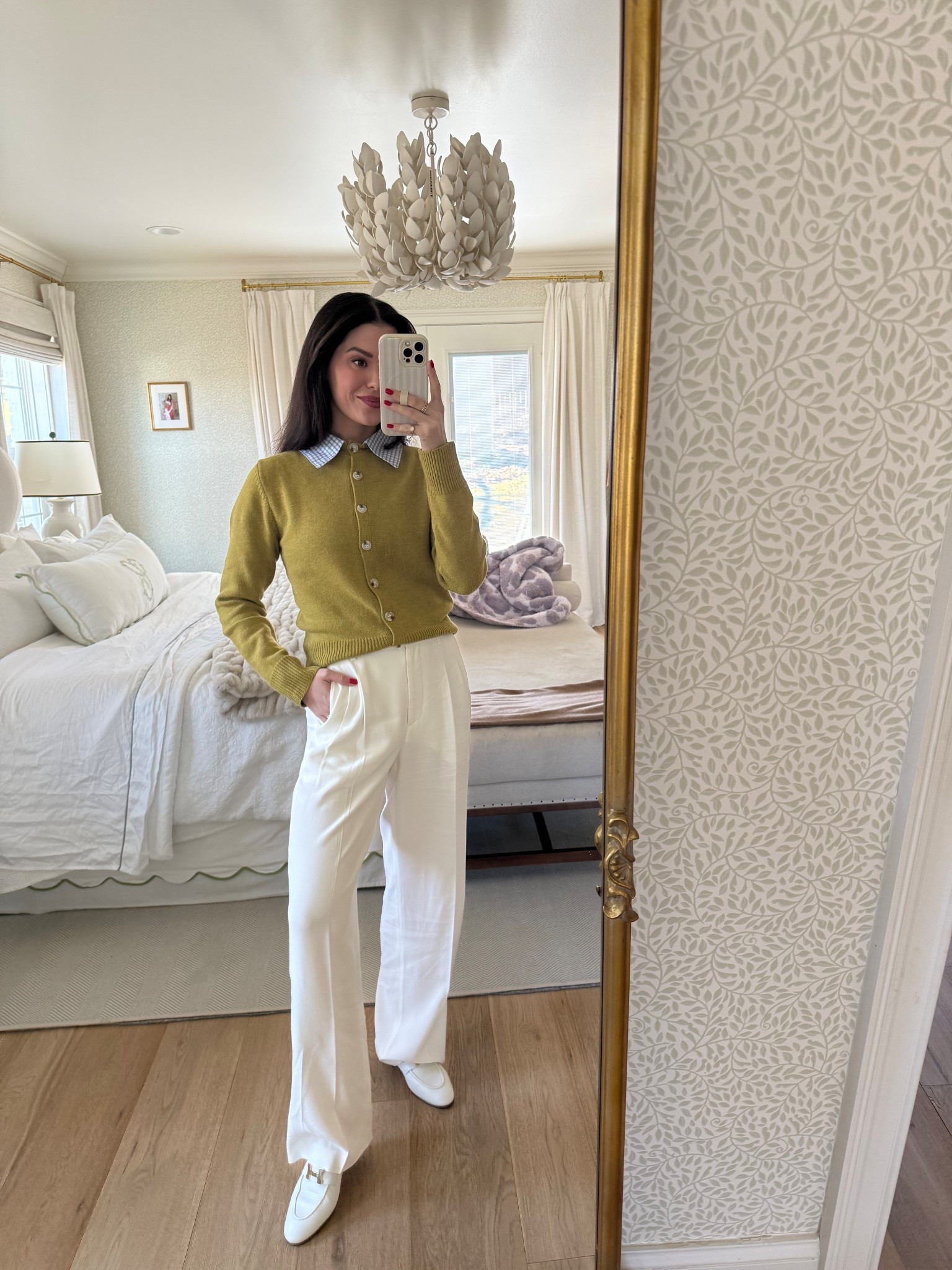 February is begging for a little color 💚 wearing an XS in the sweater and size 4 in the white trousers! Shoes are Hermes  