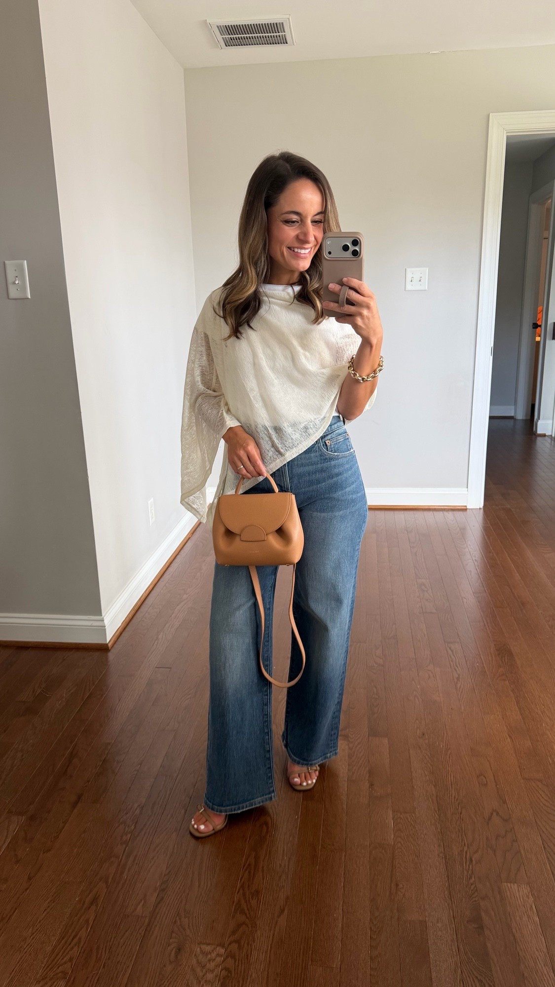Two of my favorite styles of jeans styled for summer to early and late fall! 

Madewell Perfect Vintage Wide Leg: petite 24 - 10 3/8” rise 28” inseam 

Summer 
T-shirt (Old Navy): xs 
Poncho (Free People) 
Bag (Polene Un Nano) 

Transitional outfits / early fall outfits / petite jeans

#LTKPetite