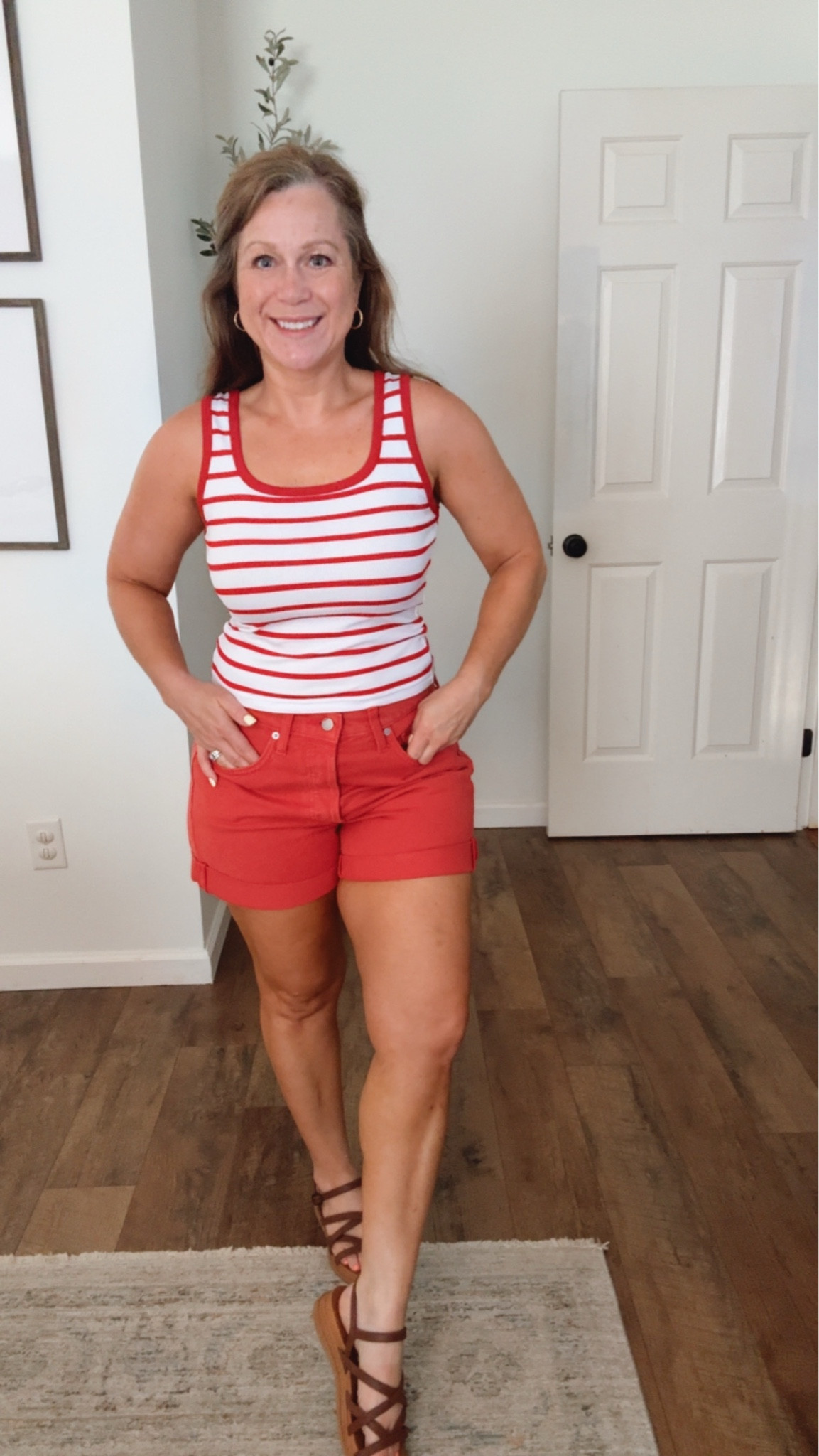 Summer outfit idea 
Perfect for the 4th of July and all summer 
Denim shorts 
Red white stripe tank 
Sandals 

I am in a small in top and  6 in Shorts, sandals TTS

#LTKPetite #LTKootd #LTKMidsize