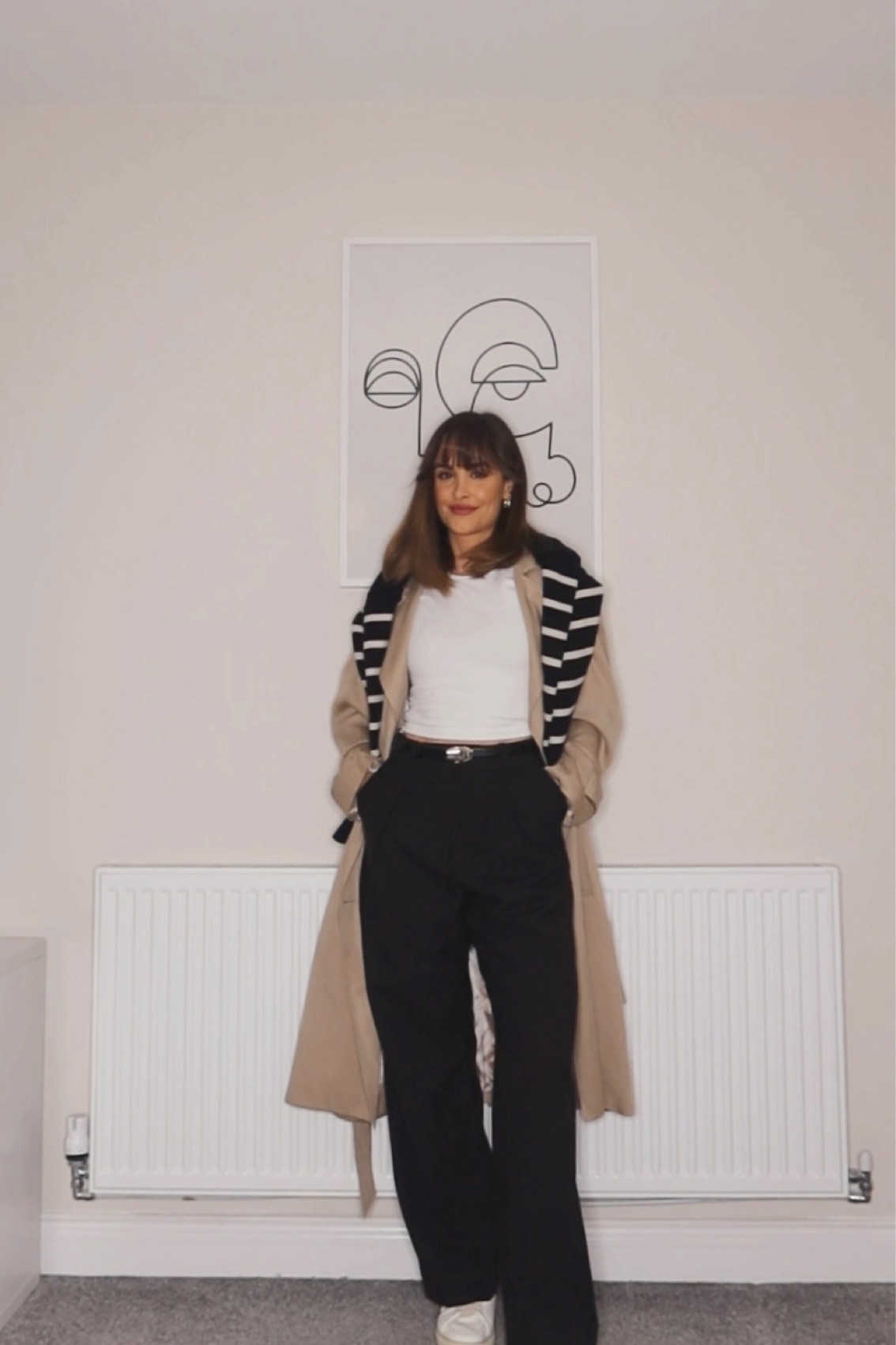 Brown trench coat, white top, black striped jumper, black straight trousers, white trainers, black belt 

#LTKeurope #LTKstyletip #LTKSeasonal