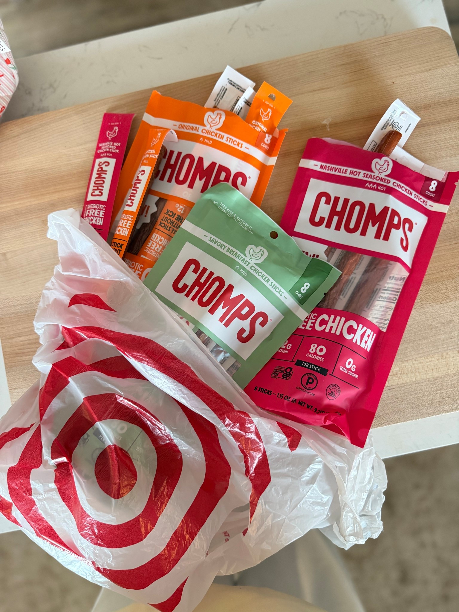 #AD Our must-have snack on-the-go! Here’s all three flavors of the chicken sticks. So good and only 80 calories, 12g of protein and 0g of sugar! Nashville hot is that girl!!!!  @target @chomps #ChompsPartner #TargetPartner