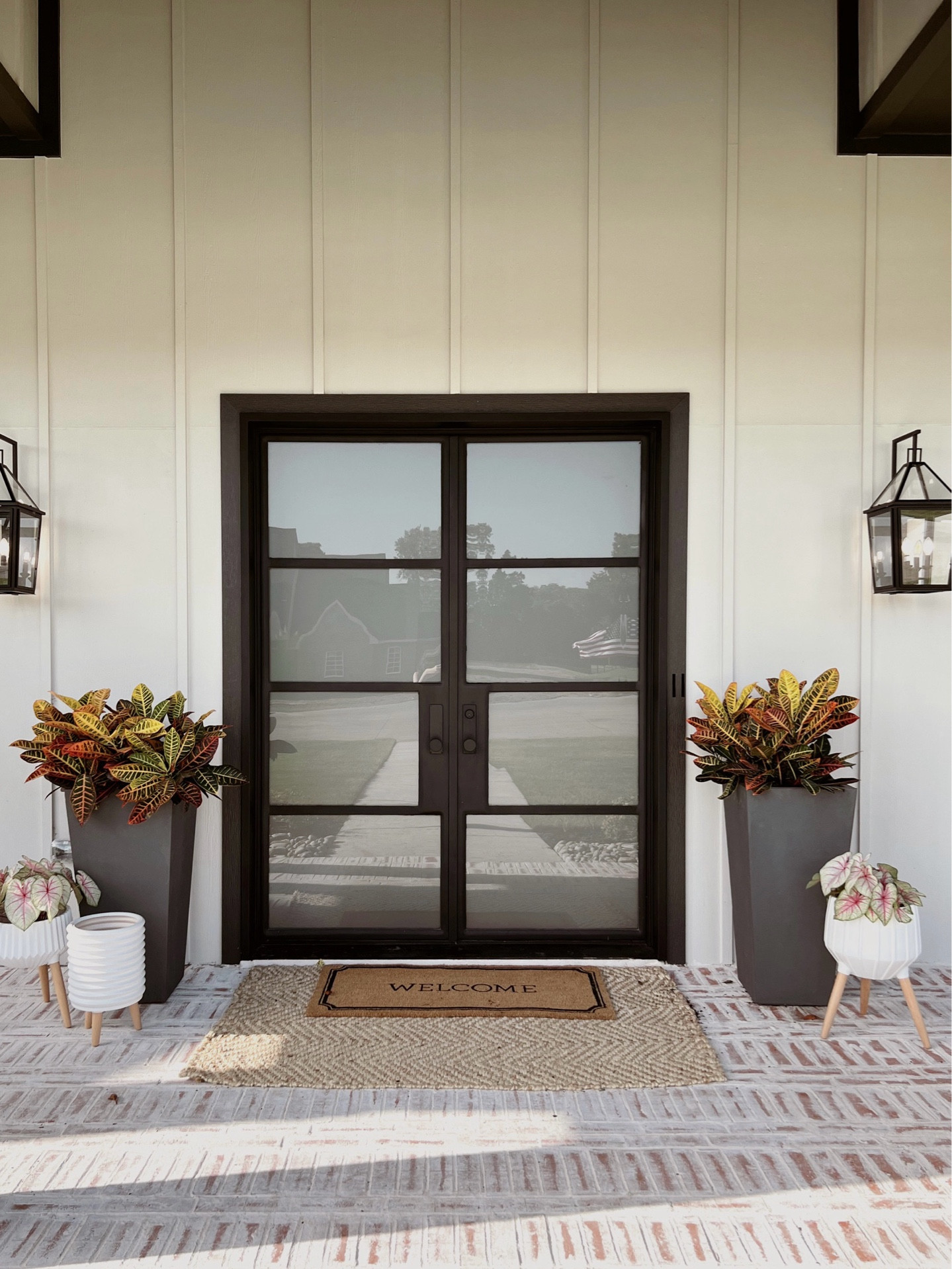 Patio rug and planters 

#LTKSeasonal #LTKHome #LTKSummerSales