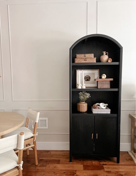 Decorated my favorite black arched book shelf for fall and added in a touch of neutral minimal Halloween decor 

#LTKSeasonal #LTKhome #LTKHalloween