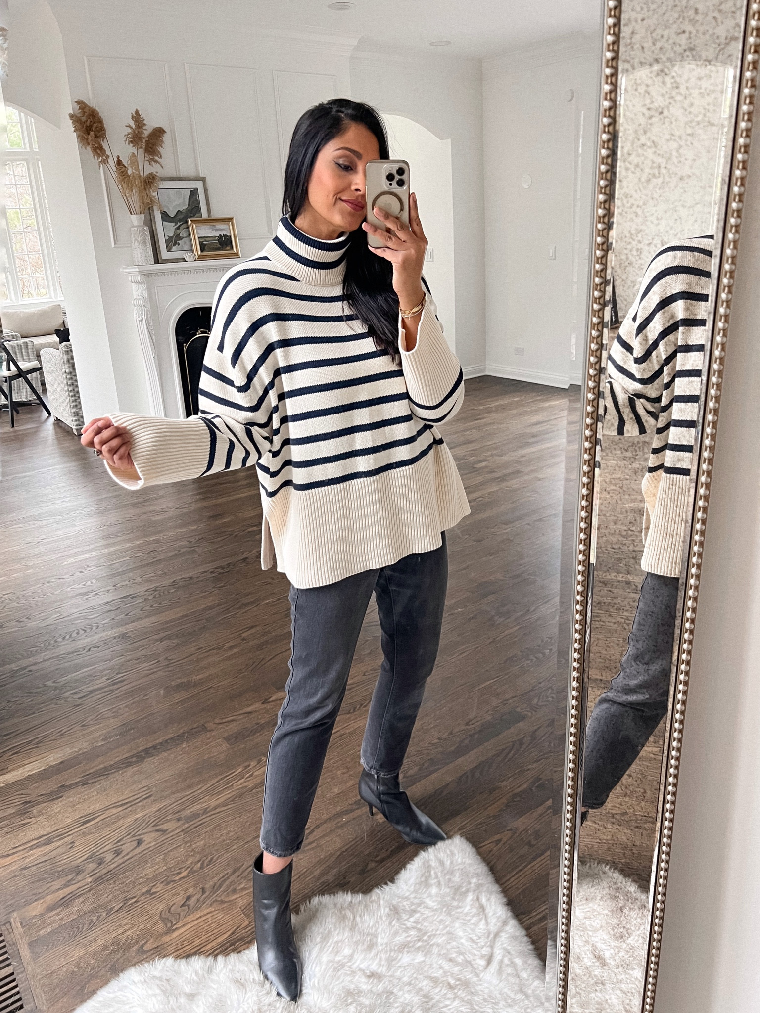 My fav stripped sweater is on sale 30% off, it’s giving designer but without the price tag. So chic, dress it up or down, on trend but a classic that can be worn years to come. Comes in solids and stripes. 
Wearing my true size L in a tall for extra sleeve length 



#LTKstyletip #LTKunder50 #LTKsalealert