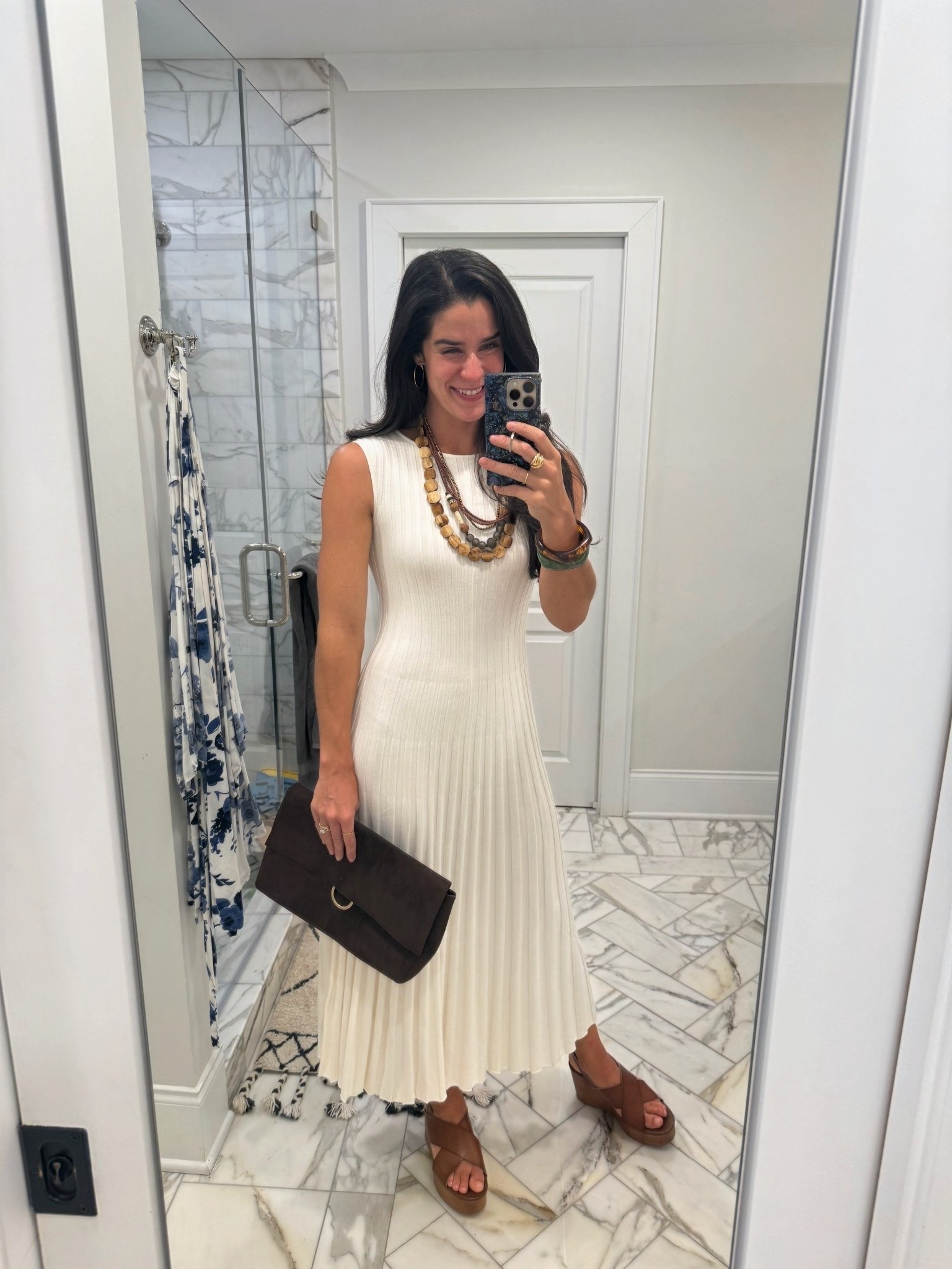 This dress is so comfortable and flattering. The back is fun and unexpected. Not see through 🙌🏼 
I sized down one. Wearing an XS.

The most comfortable and fun wedges. Run TTS. Wearing a 9

This bag looks so much nicer than it is! Such a steal. Great size for a statement 

Love my ring and bangles. Also great statements that pair well with countless looks 

My necklaces are old Twine and Twig but can be found on Poshmark, etc! 