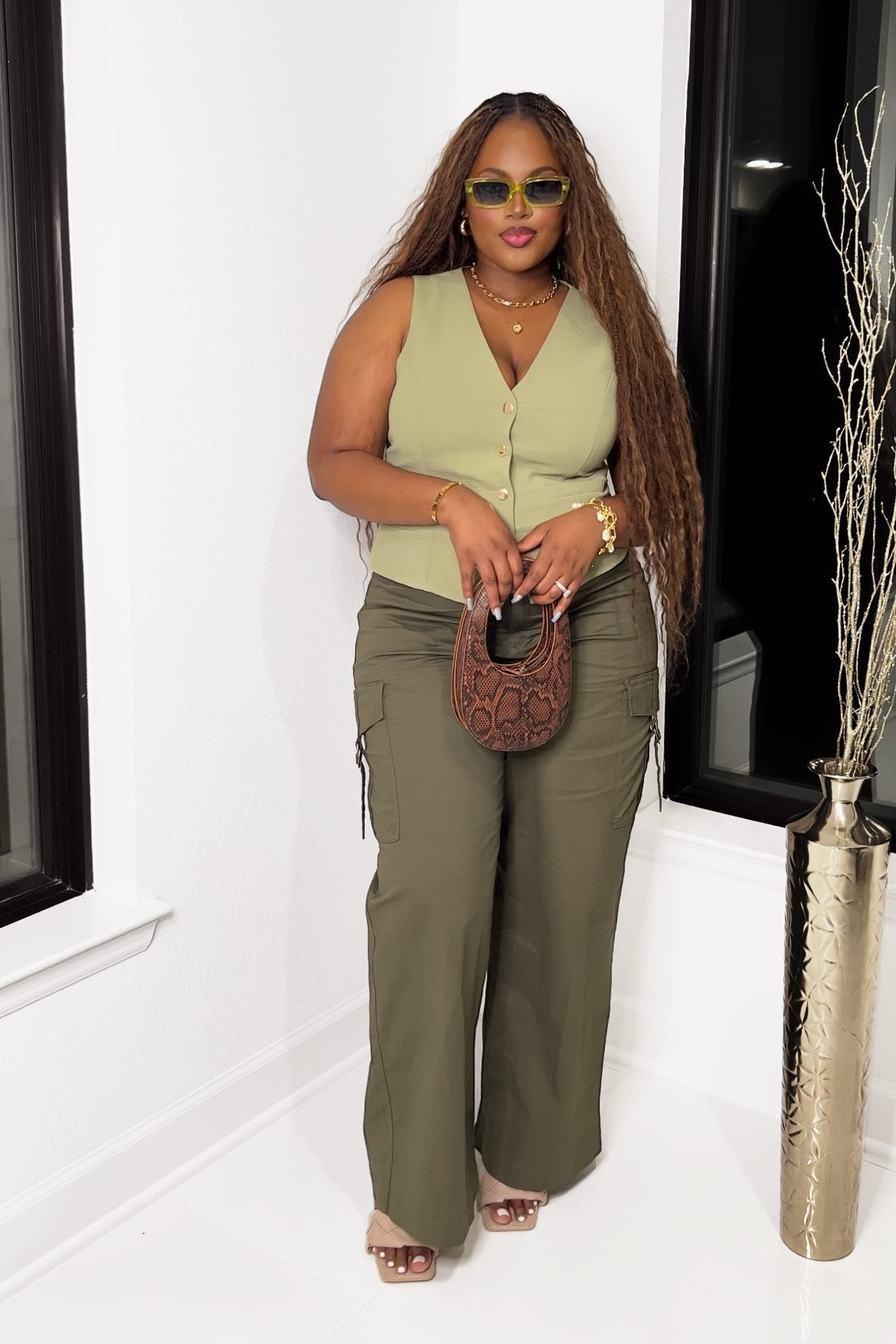 @hillaryapugo_  let the girlies know it’s vest season! This is definitely my new staple, easy to style and dress up or down! Accessories would take any outfit from basic to elevated real quick and more is more with accessories for me 😂

Pants: @walmartfashion 
Vest: @tjmaxx 
Shoes: @fashionnova 
Glasses: @fashionnova 
Jewelry: @targetstyle 
Cuff: @toryburch 

midsize summer dress, midsize mom, tjmaxx, mom belly, midsize style, size 12/14 outfits, vacation outfits
#summerstyle #midsize #curvygirl

#LTKMidsize #LTKStyleTip #LTKFindsUnder100