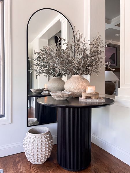 Corner table styling with arched floor mirror. Love the fluted base of this table!! 

#LTKhome #LTKfindsunder100 #LTKstyletip
